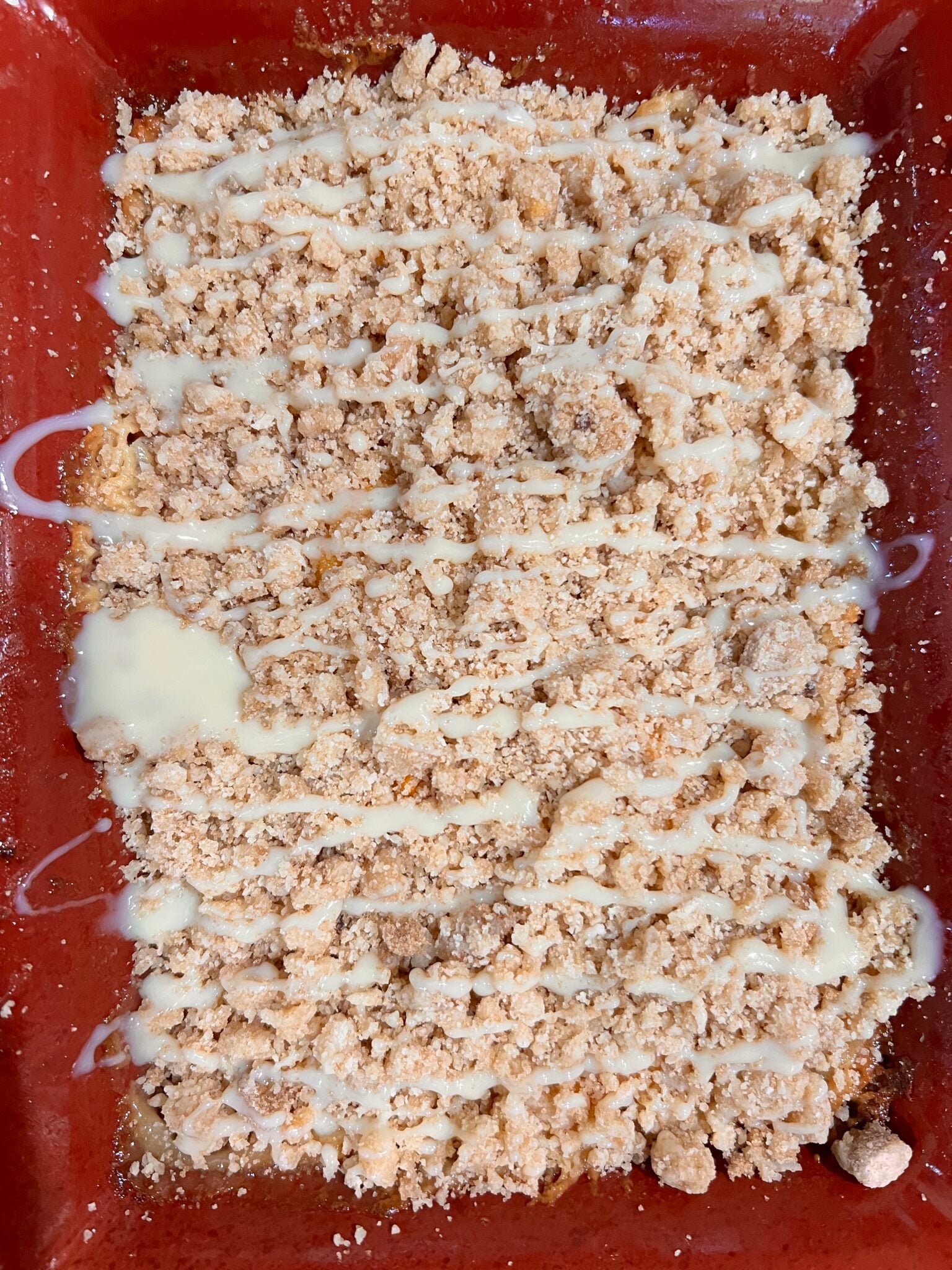 Adding crumble and condensed milk