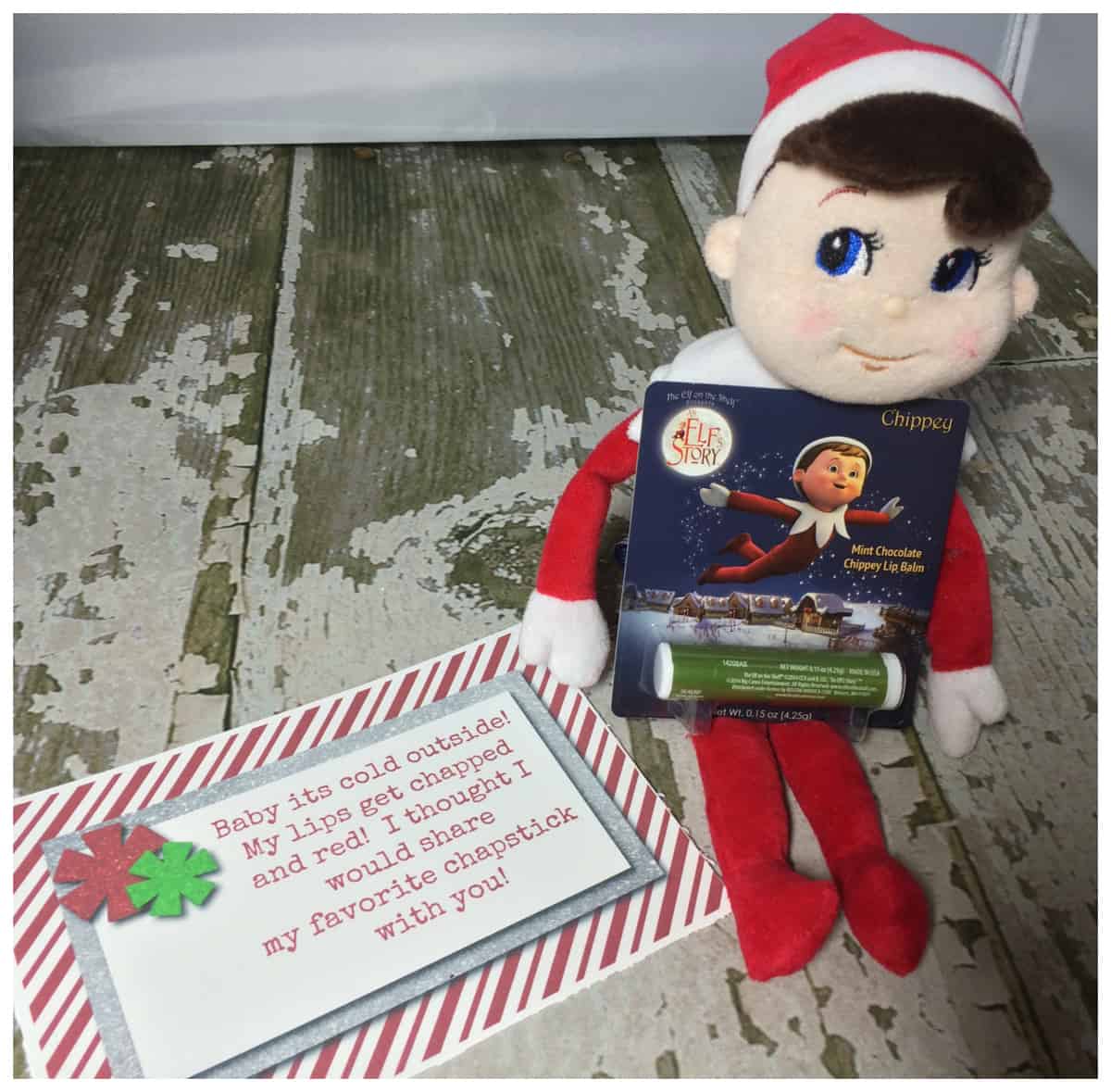 Plush elf on the shelf toy with a dvd and a note about sharing a movie and a snack, including free printables.