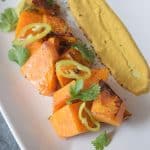 A plate of food, with Curry and Potato