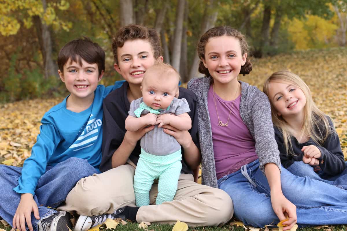 A group of people sitting posing for the camera