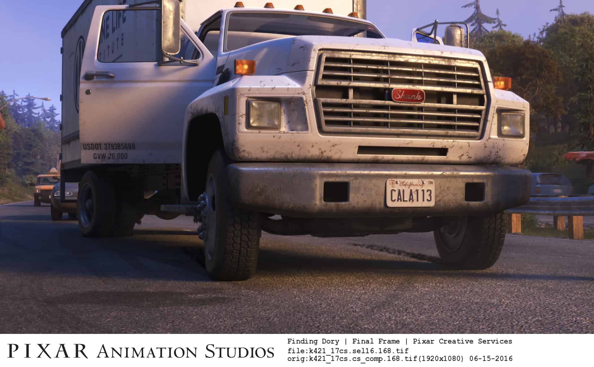 A truck is parked on the side of a road