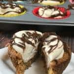 A piece of chocolate cake on a plate, with Cookie and Cheesecake