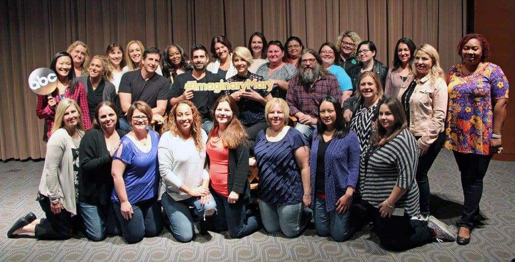A group of people posing for a photo