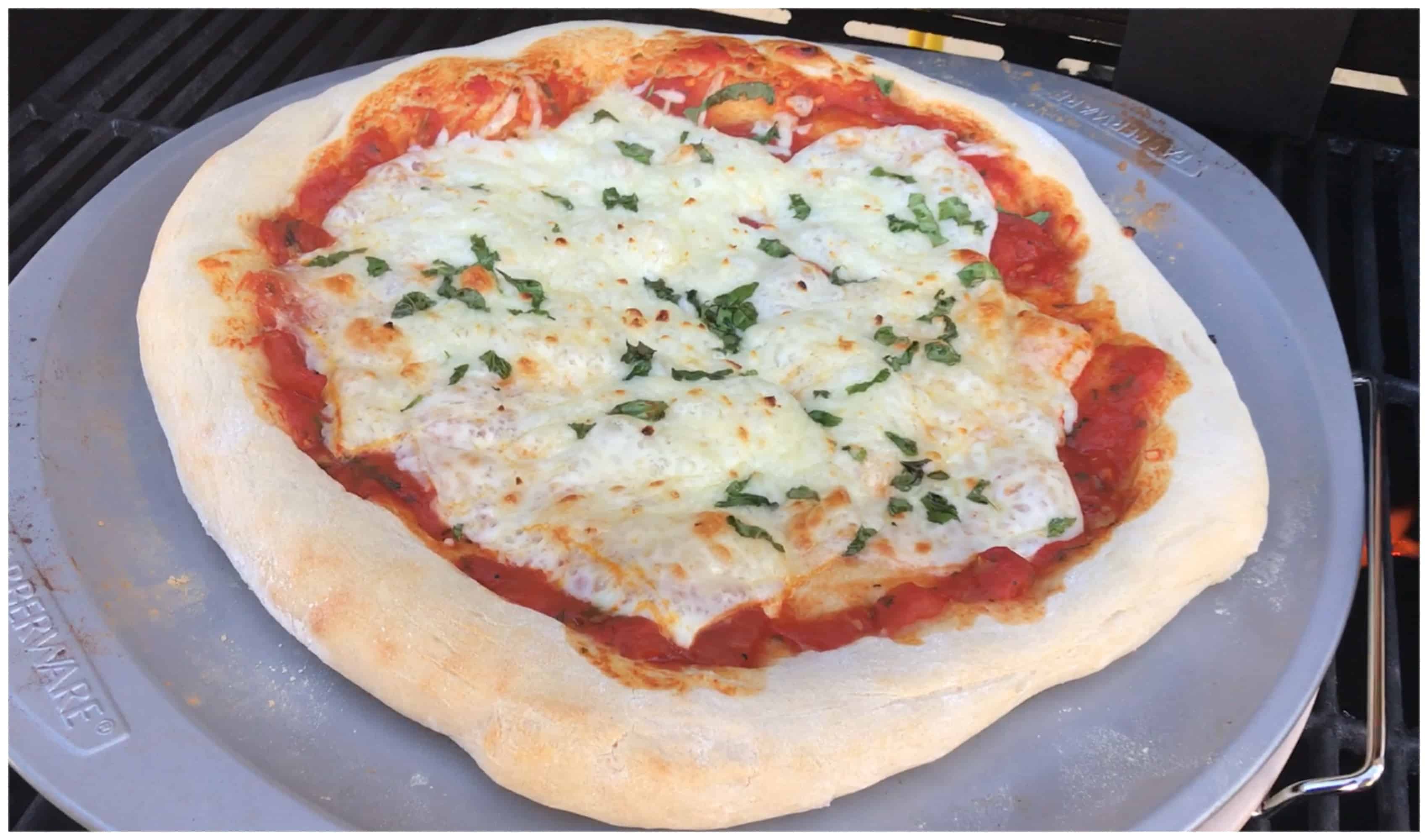 A pizza sitting on top of a plate of food, with Cheese and Baking stone