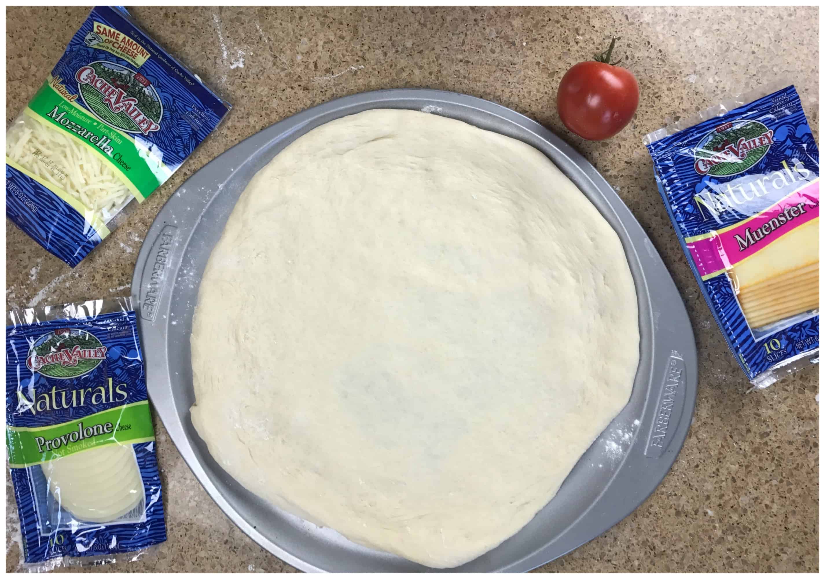 Pizza dough on a pizza pan