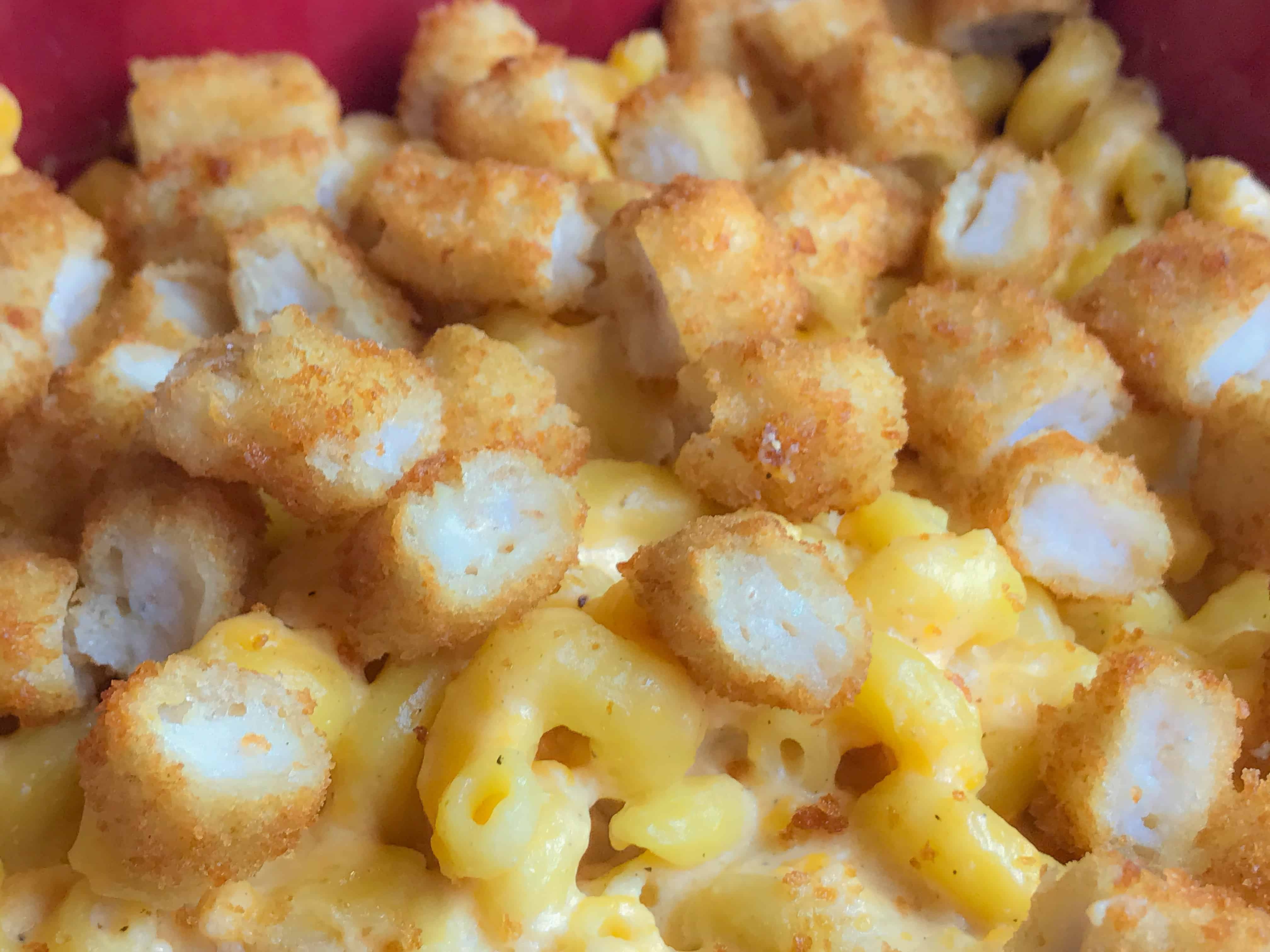 A dish is filled with food, with Cheese