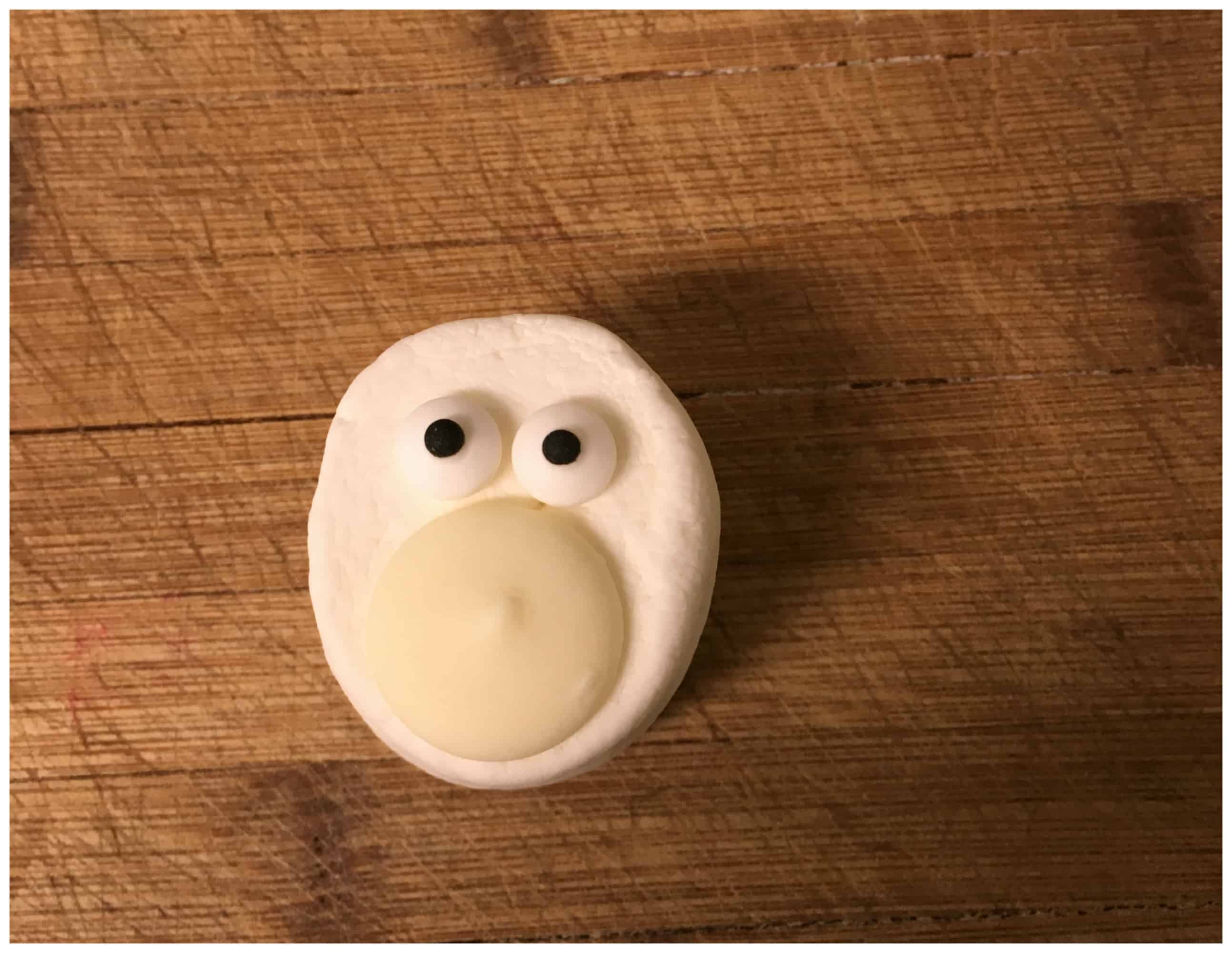 A close up of a bowl, with Chocolate and Marshmallow