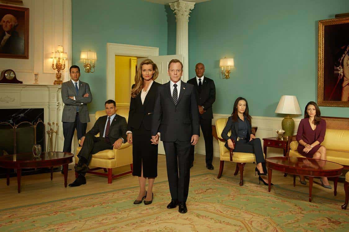 Natascha McElhone et al. standing in a room