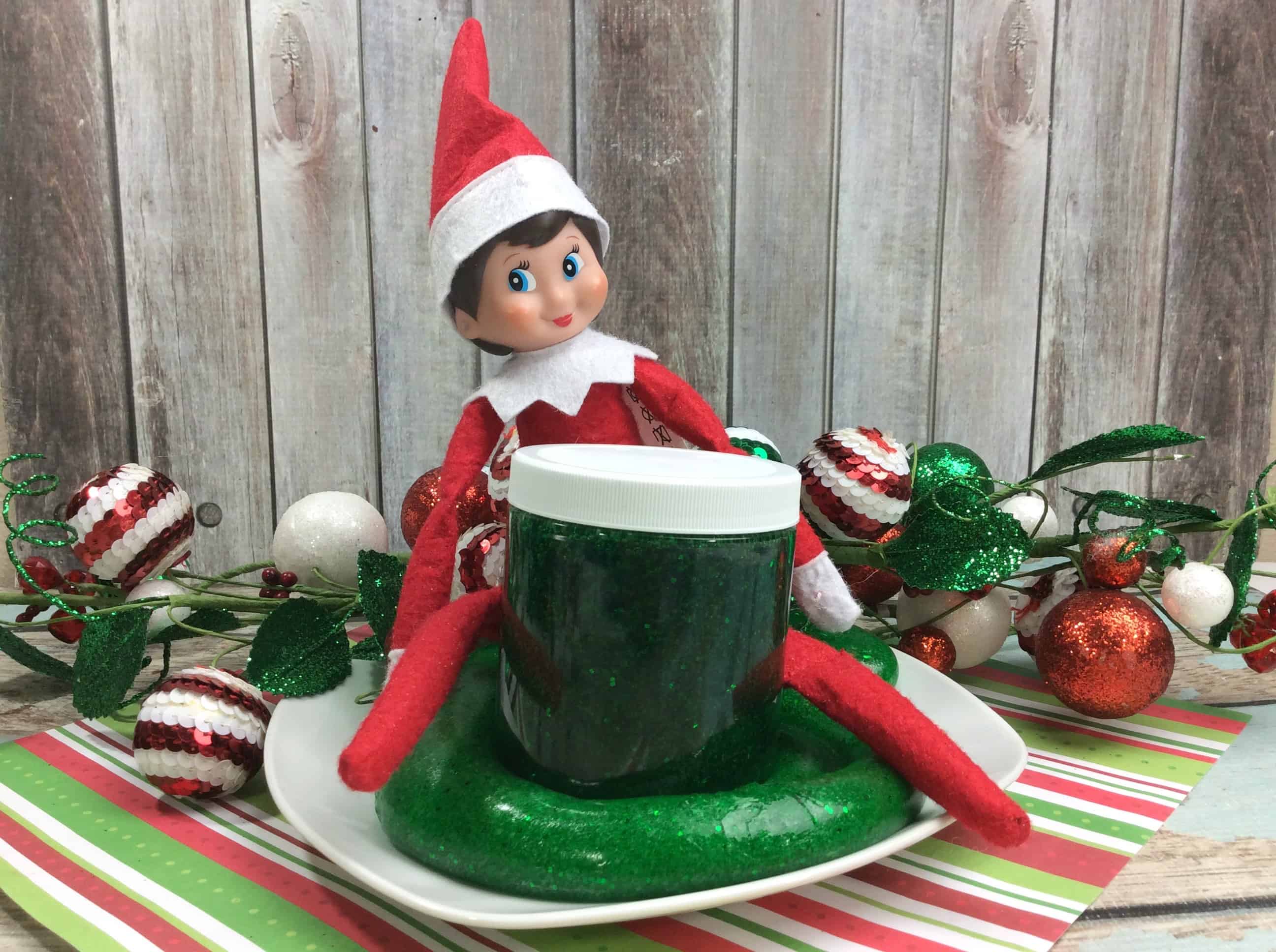 A little boy sitting at a table with a plate of food, with Elf and Slime