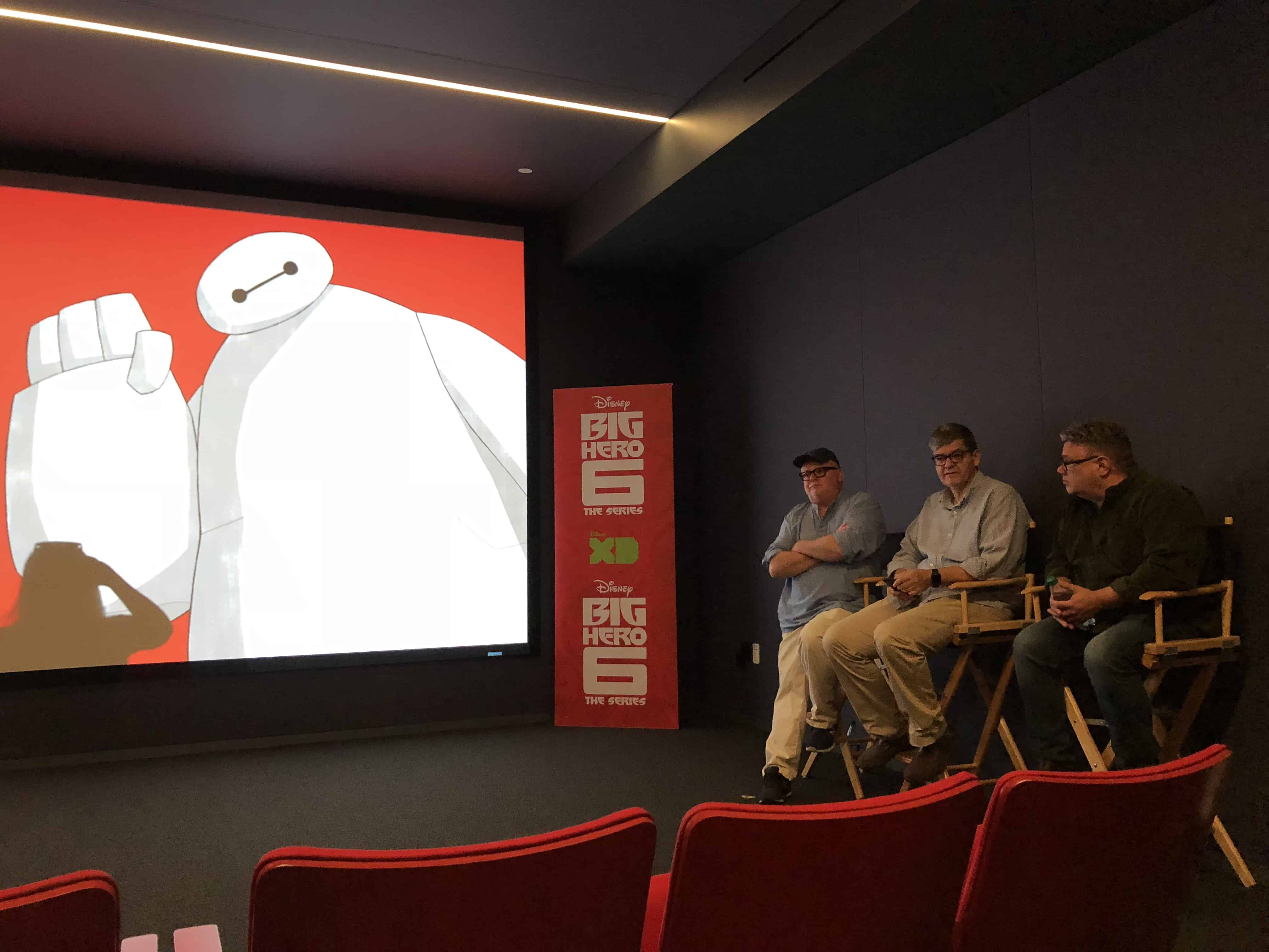 A group of people standing in a room