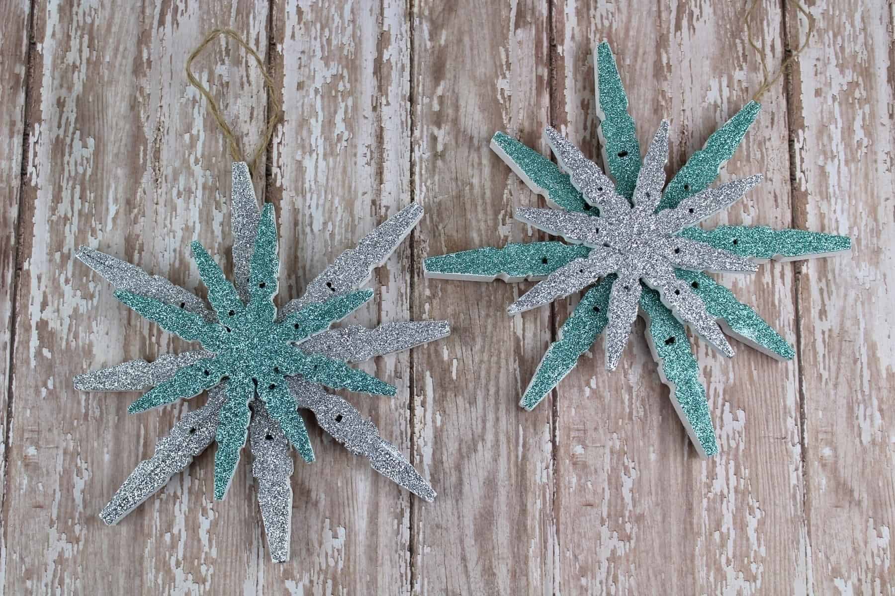 A snowflake craft on a wooden table