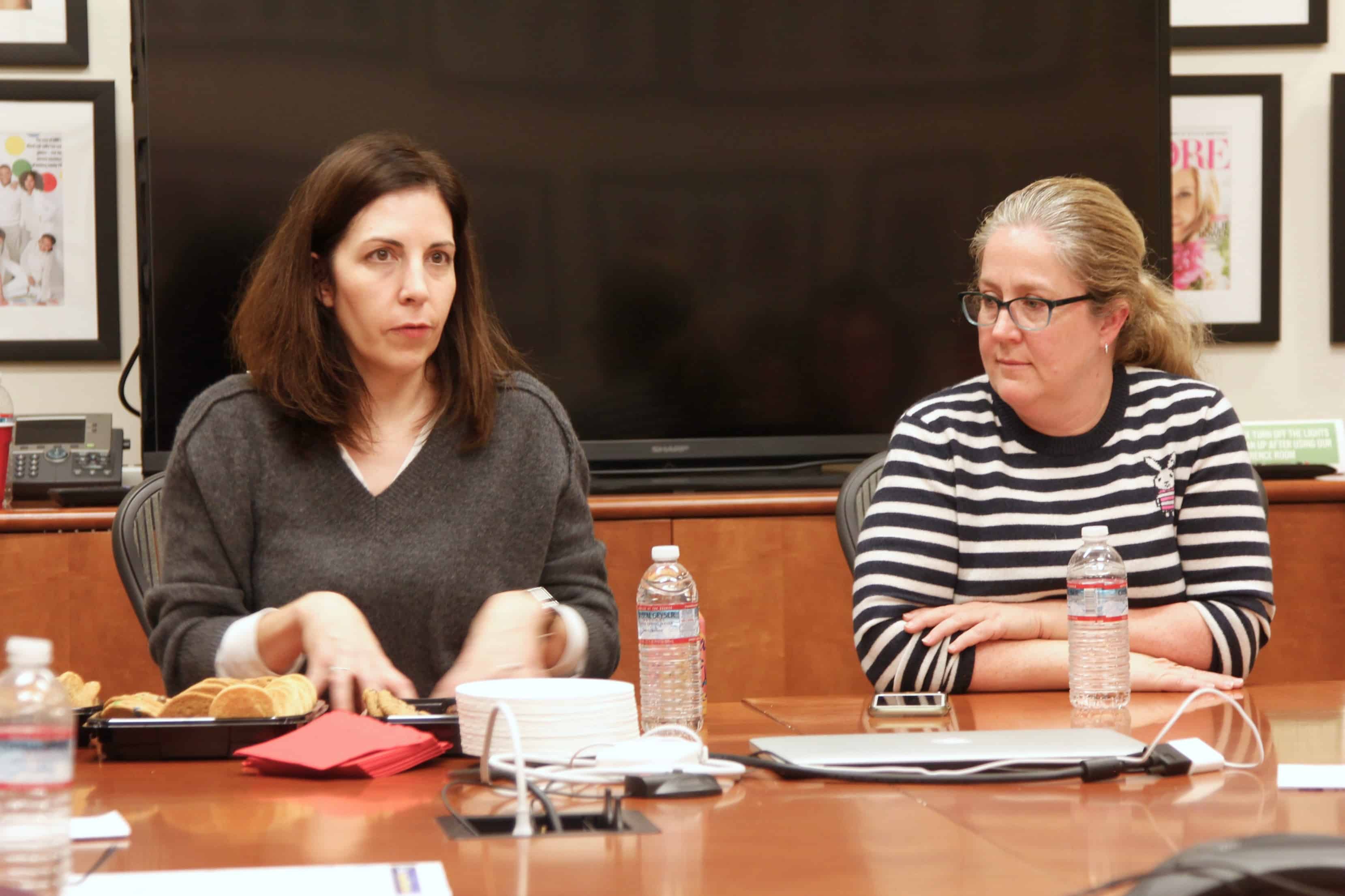 A group of people sitting at a table