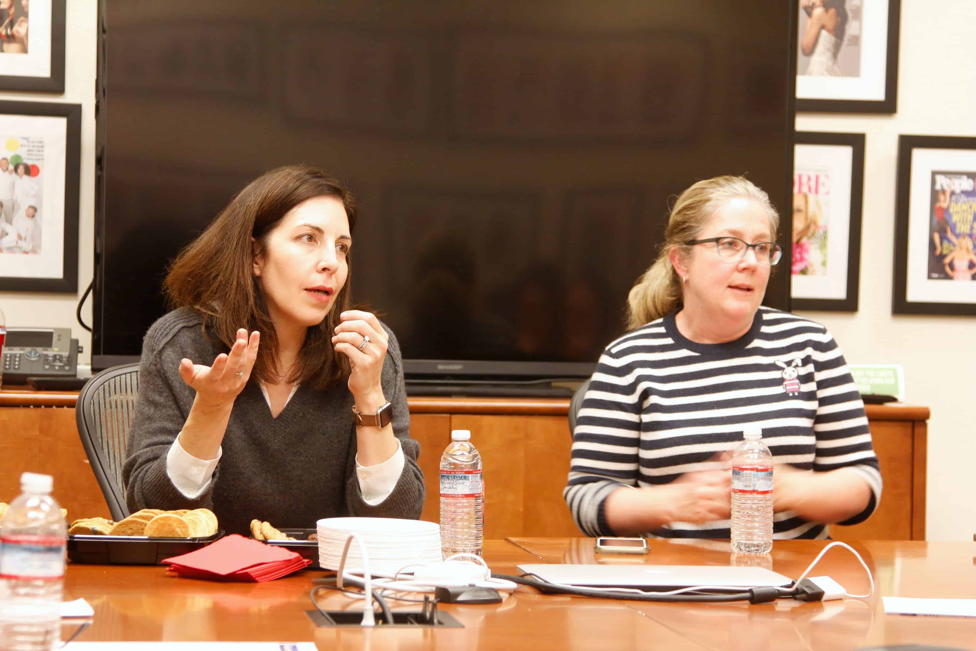 A group of people sitting at a table