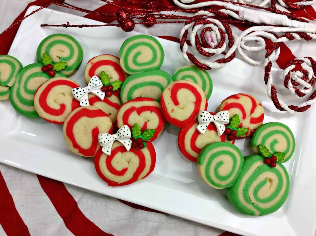 A decorated cake on a plate, with Cookie and Royal icing