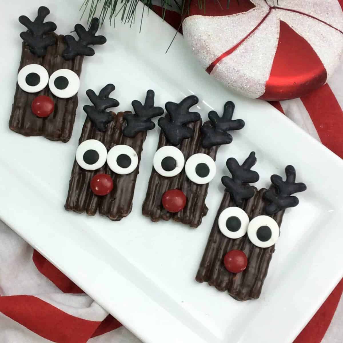 A plate of birthday cake on a table, with Pretzel