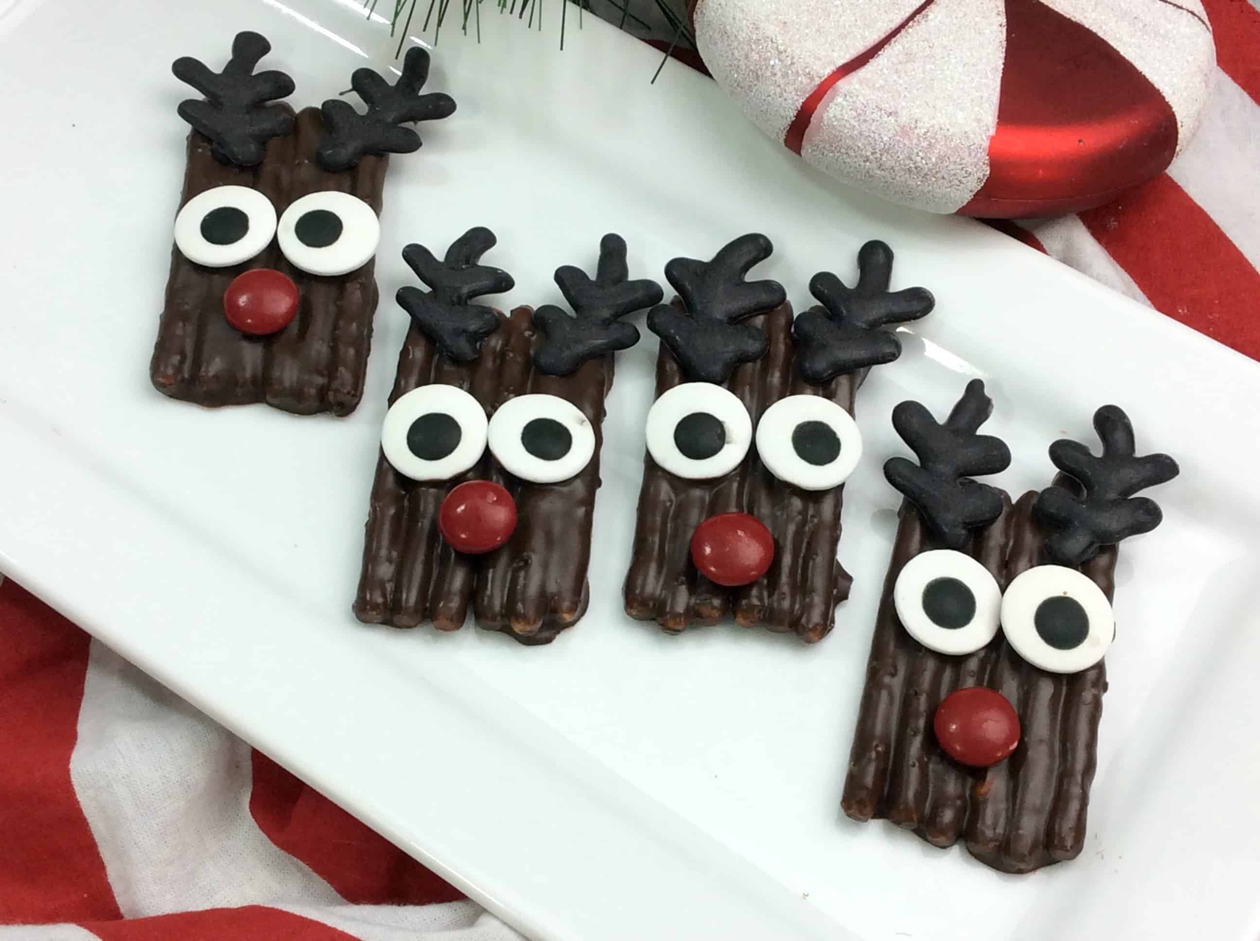 A plate of food on a table, with Pretzel and Chocolate