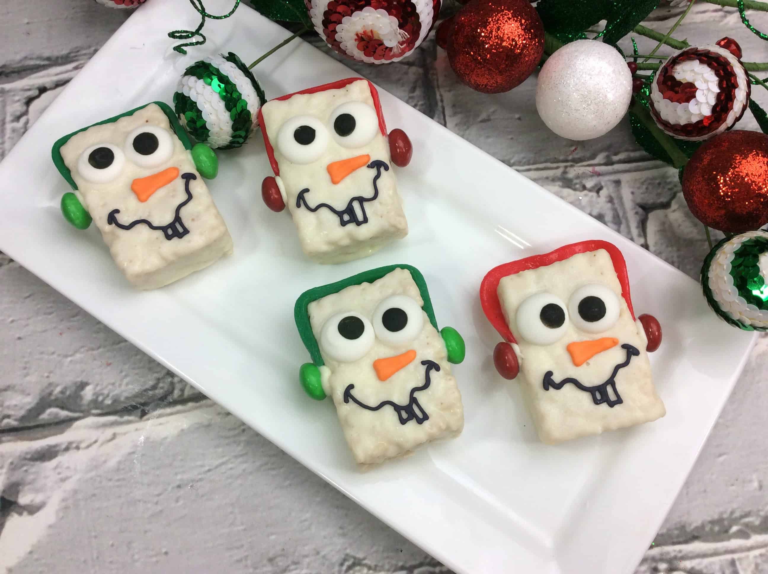 Snowman treats on white plate