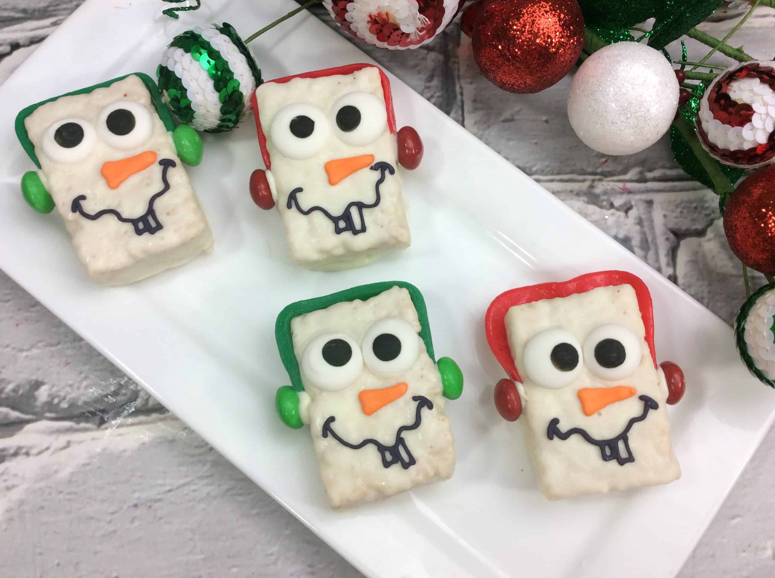 Snowman treats on white plate