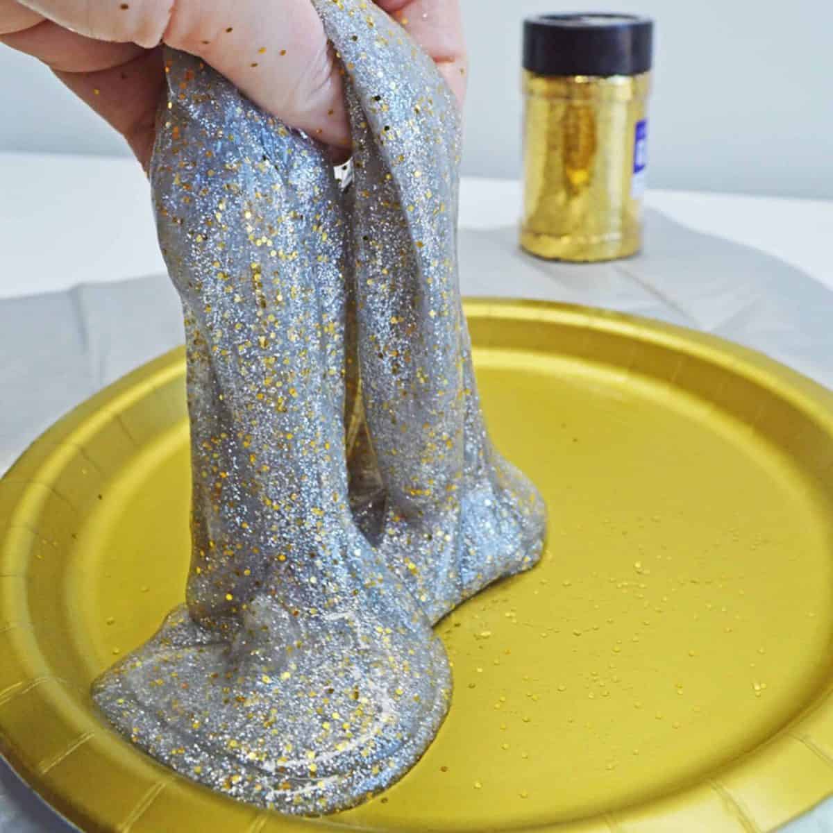 Glitter and slime on gold plate