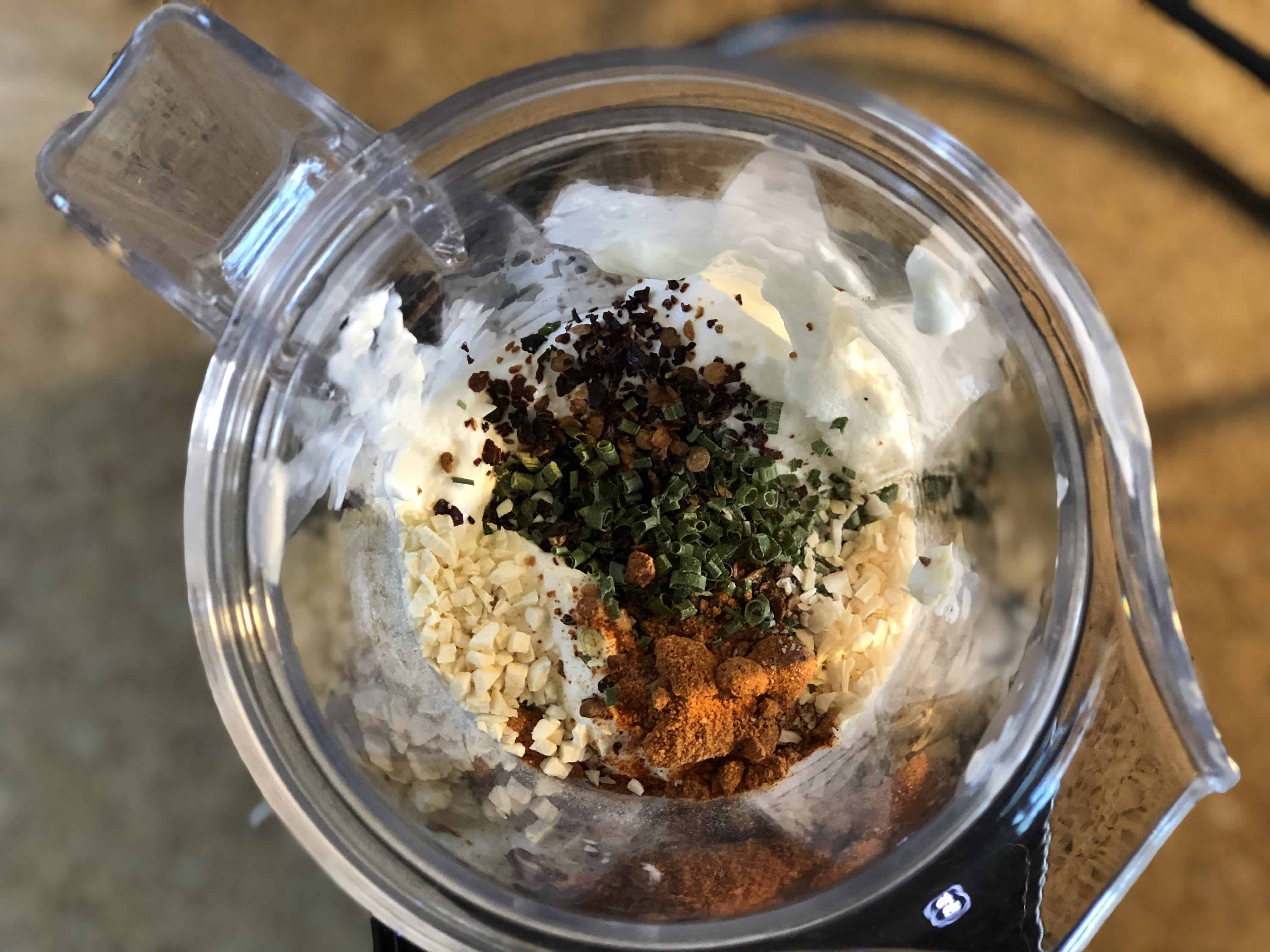 A bowl of food, with Egg and Bacon
