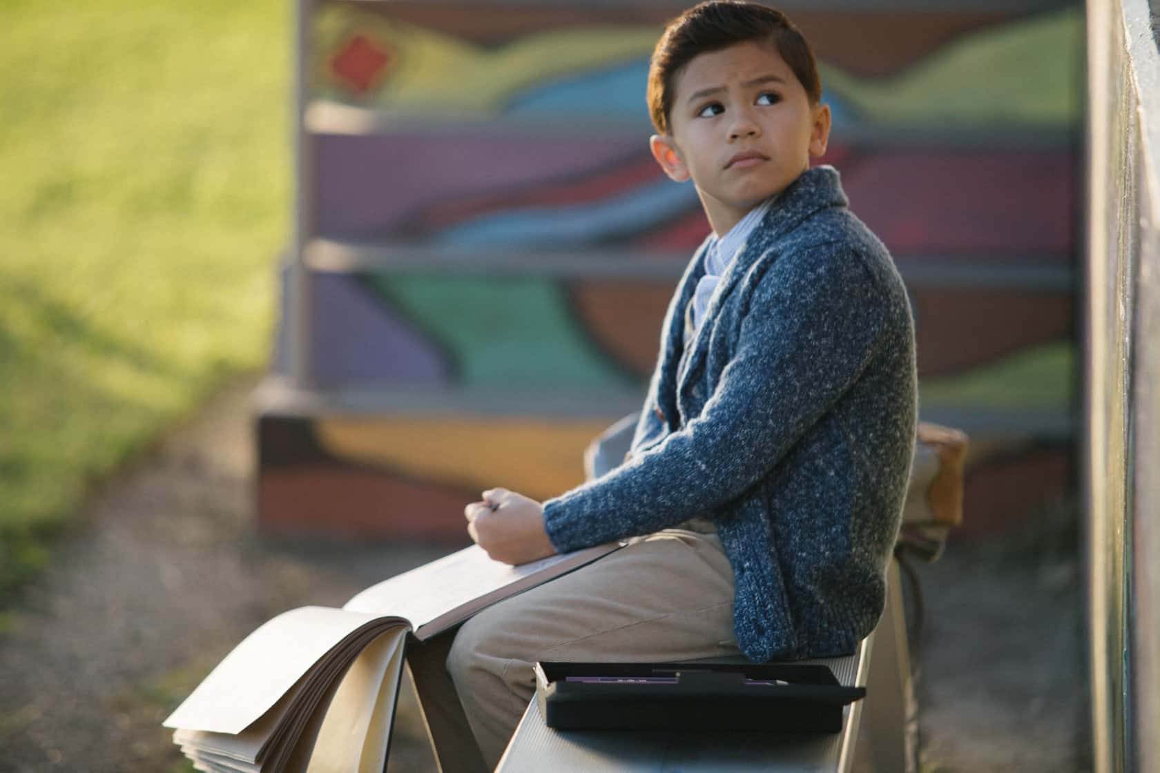 A person sitting on a bench