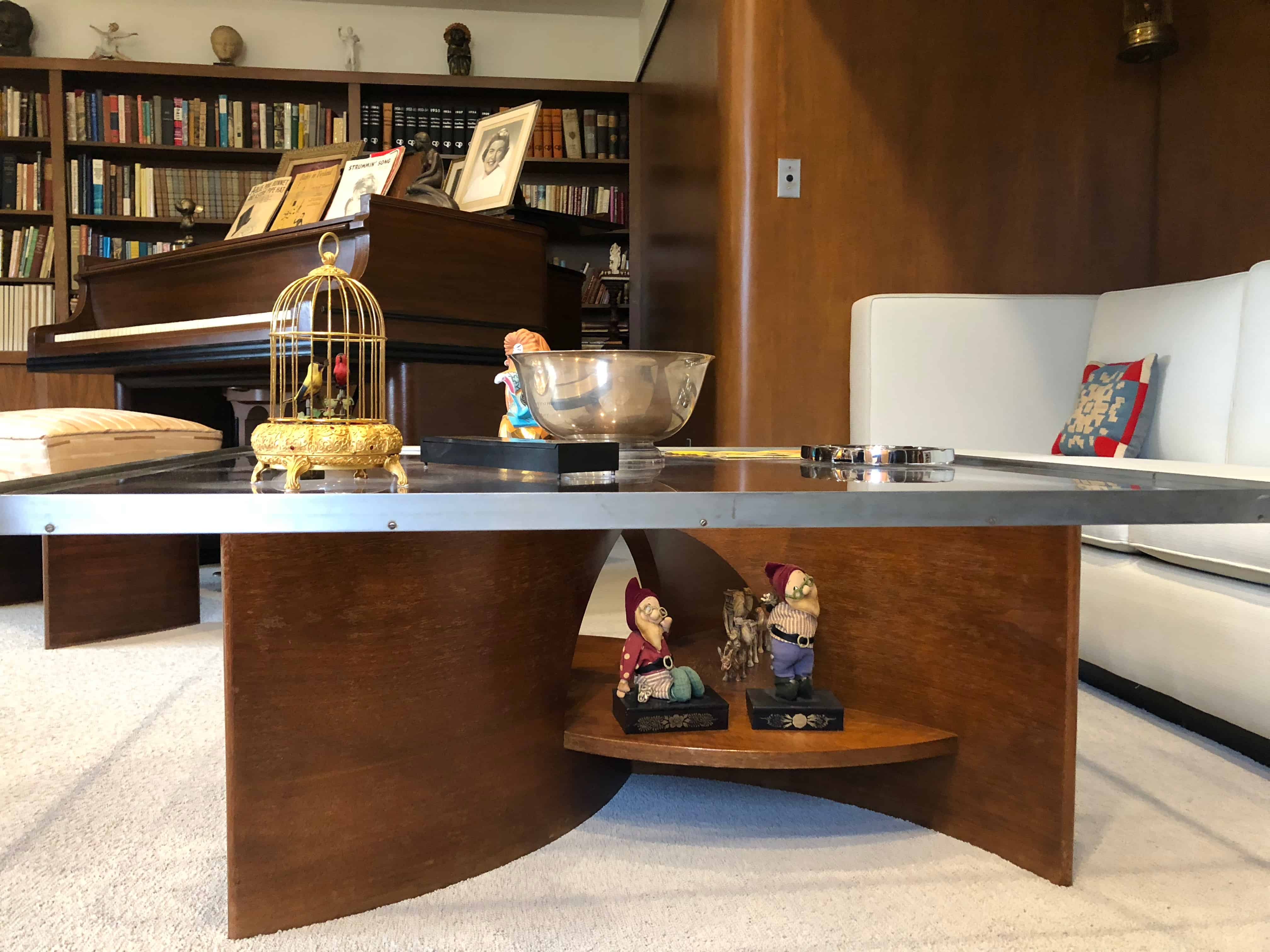 A desk with a book shelf