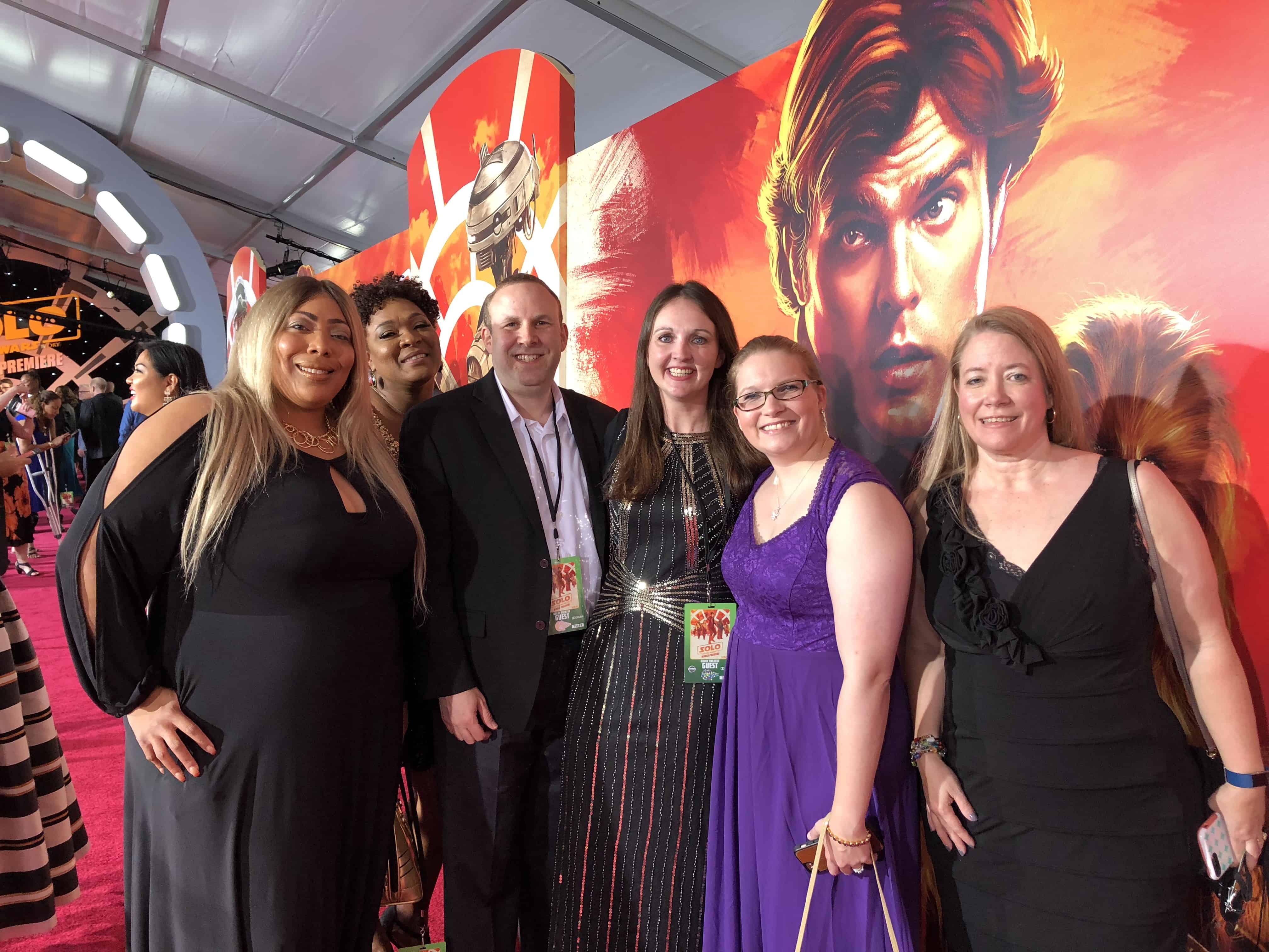 A group of people posing for the camera