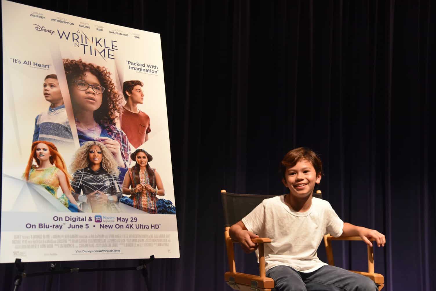 A kid posing for the camera