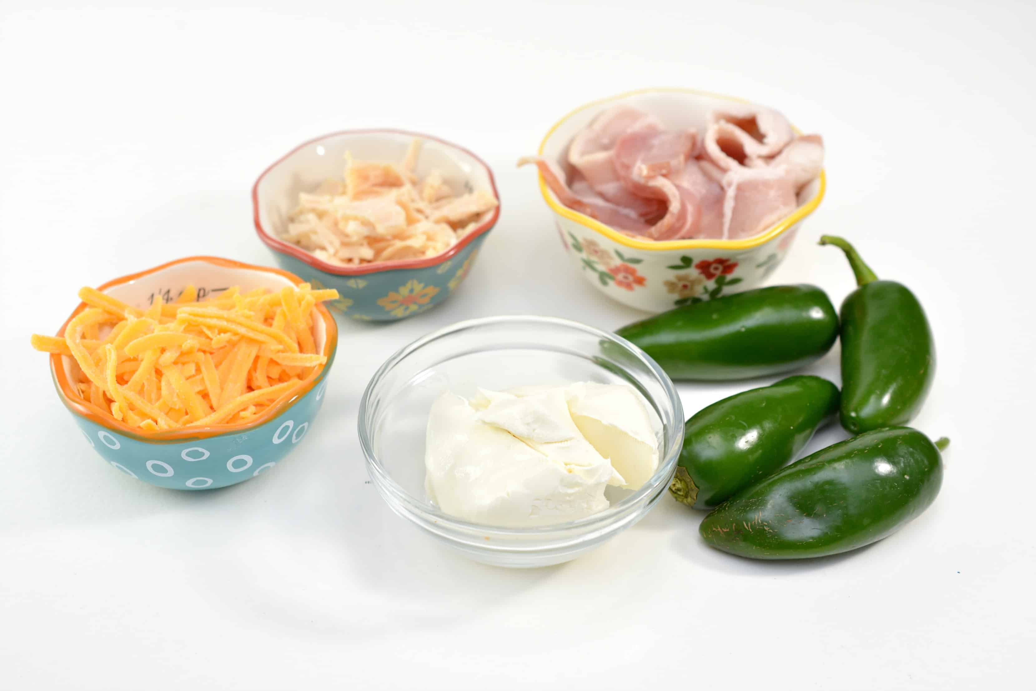 Keto Chicken Stuffed Jalapeno Poppers A bowl of ingredients on a table