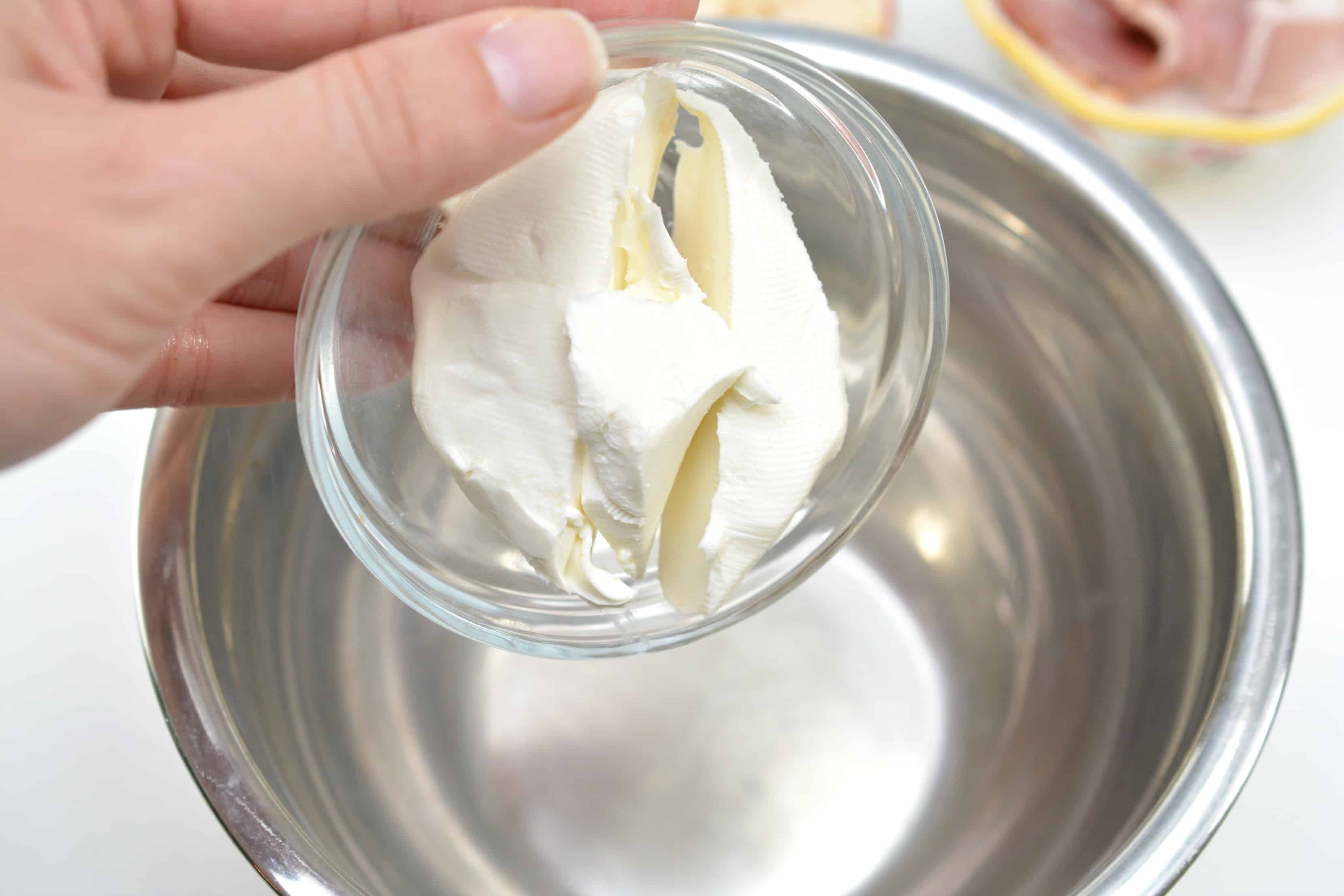 A glass bowl, with cream Cheese