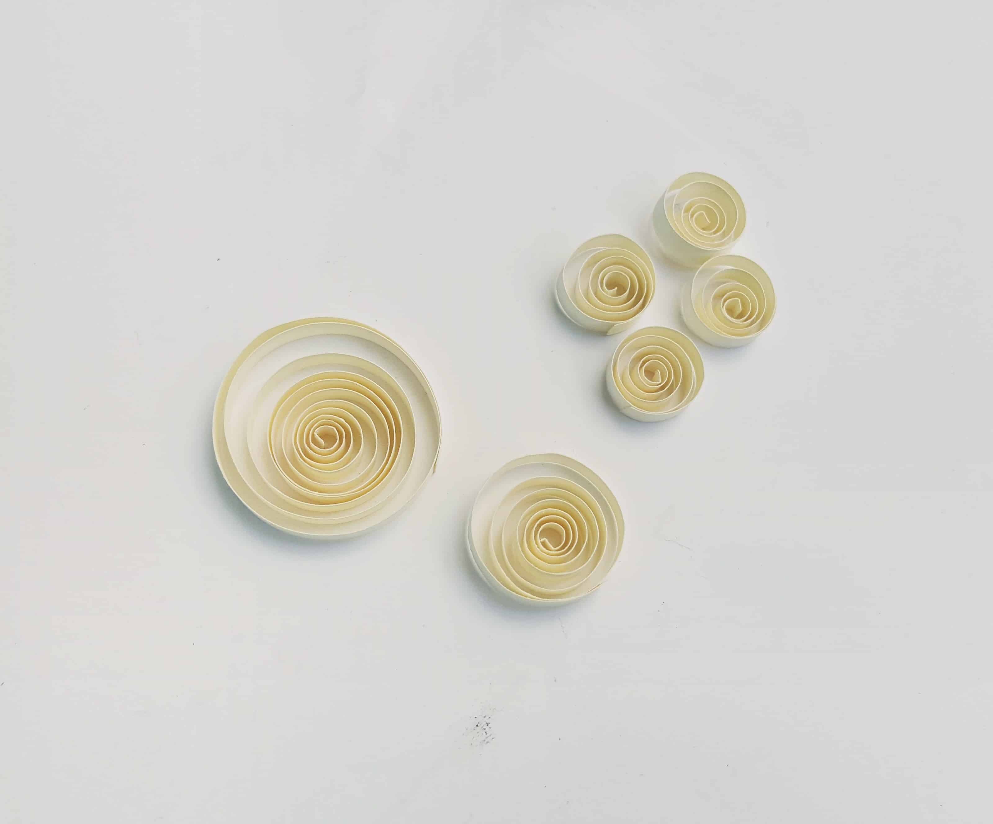 small pieces of paper quilled