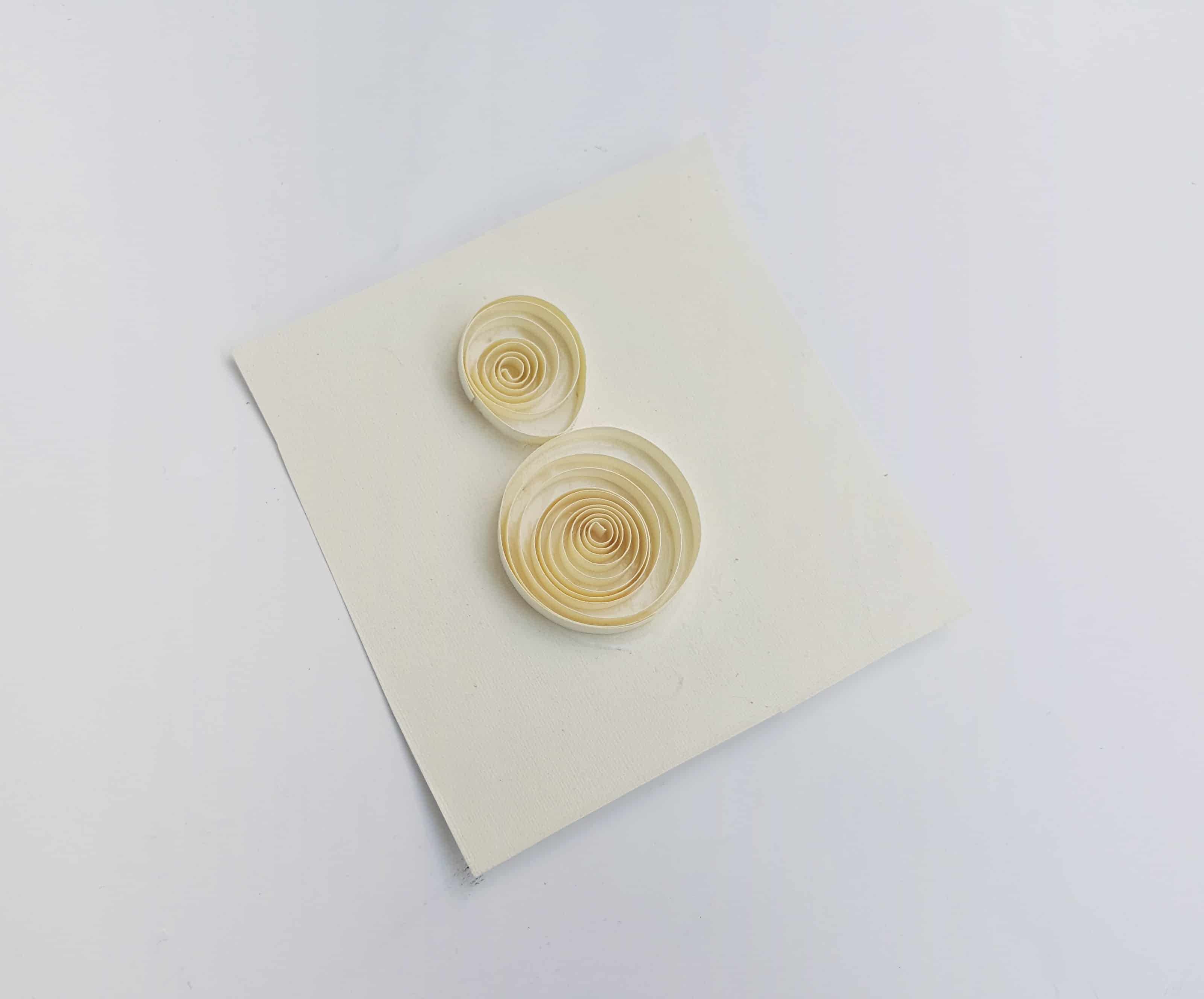 small pieces of paper quilled
