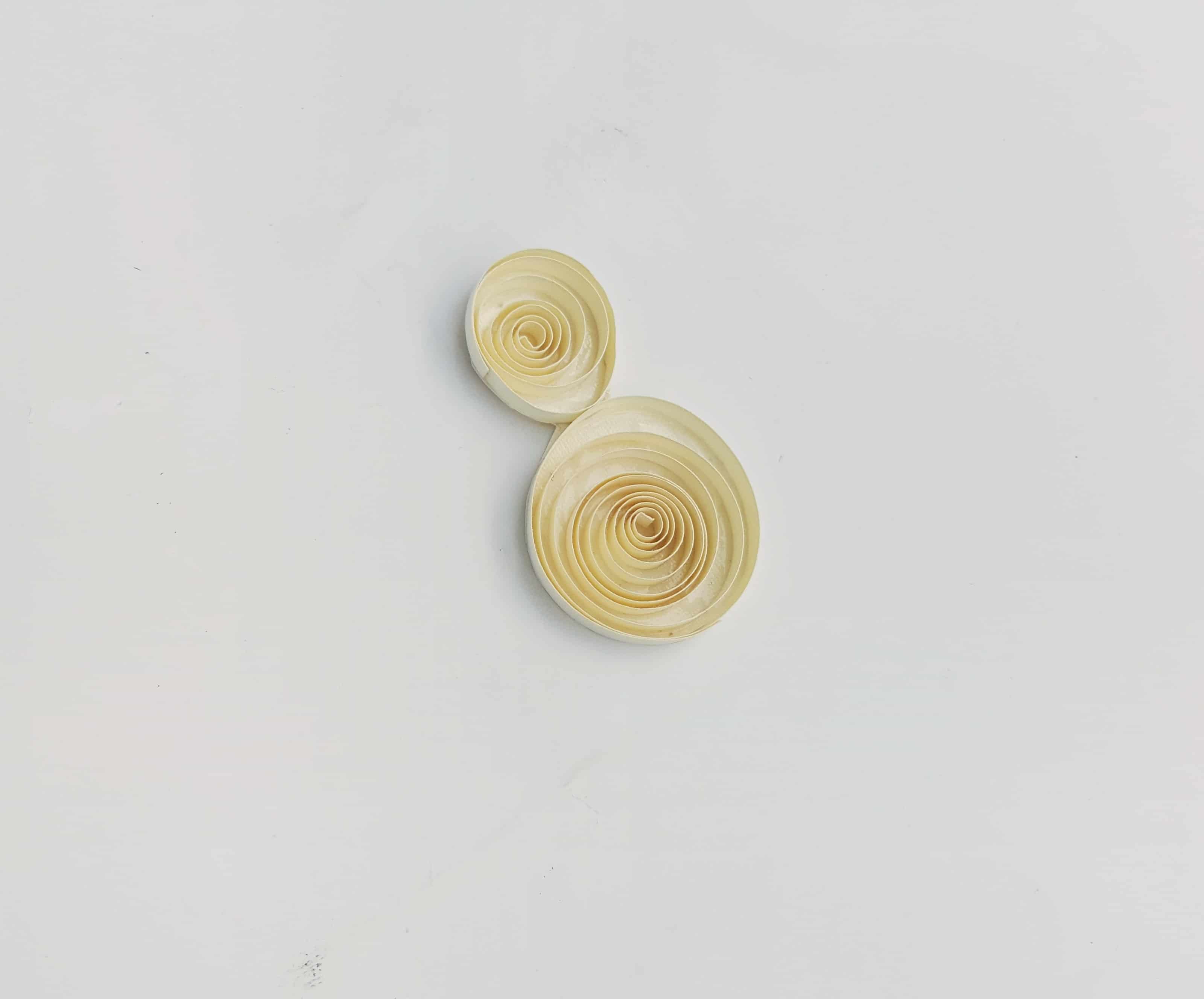 small pieces of paper quilled