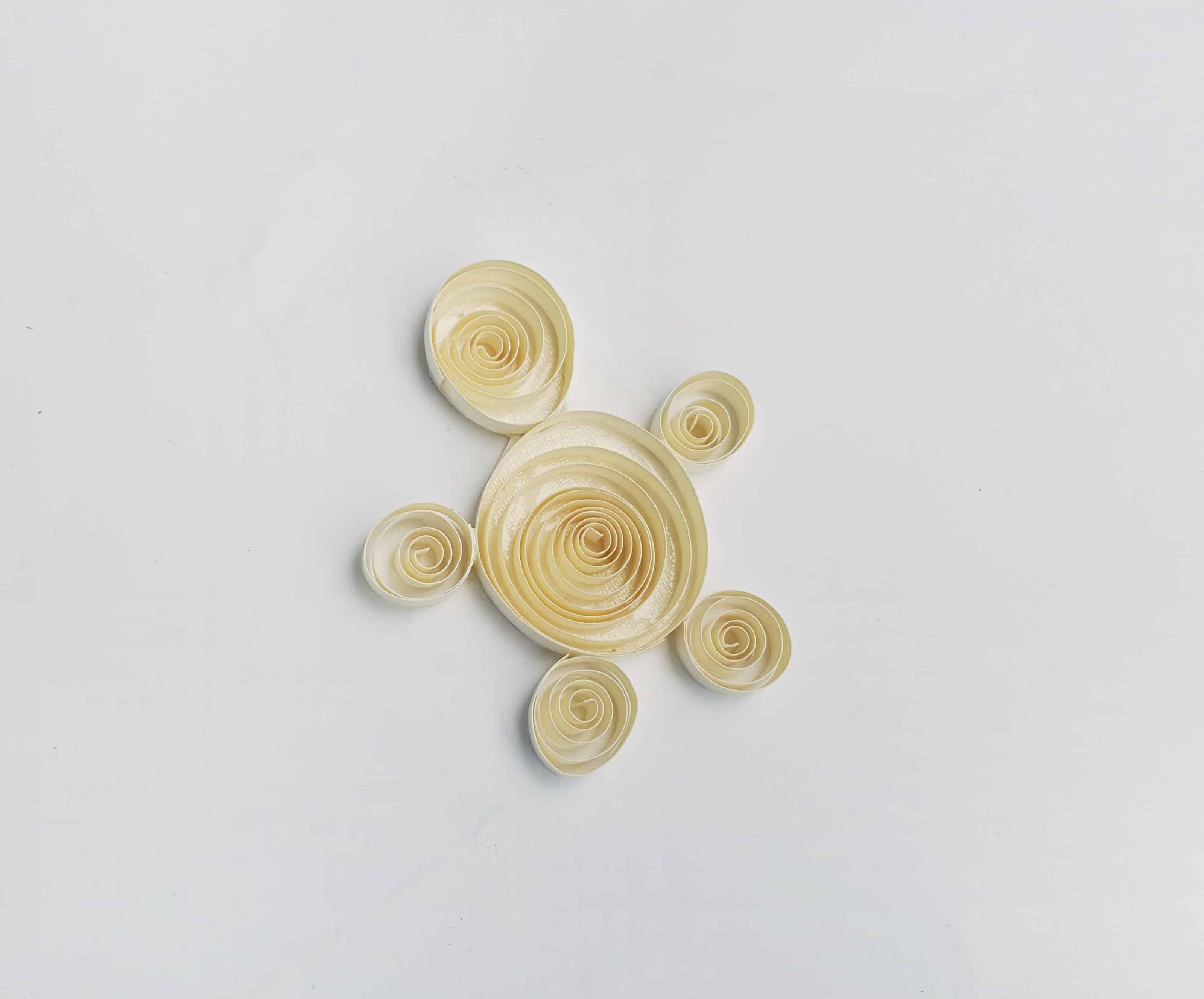 small pieces of paper quilled