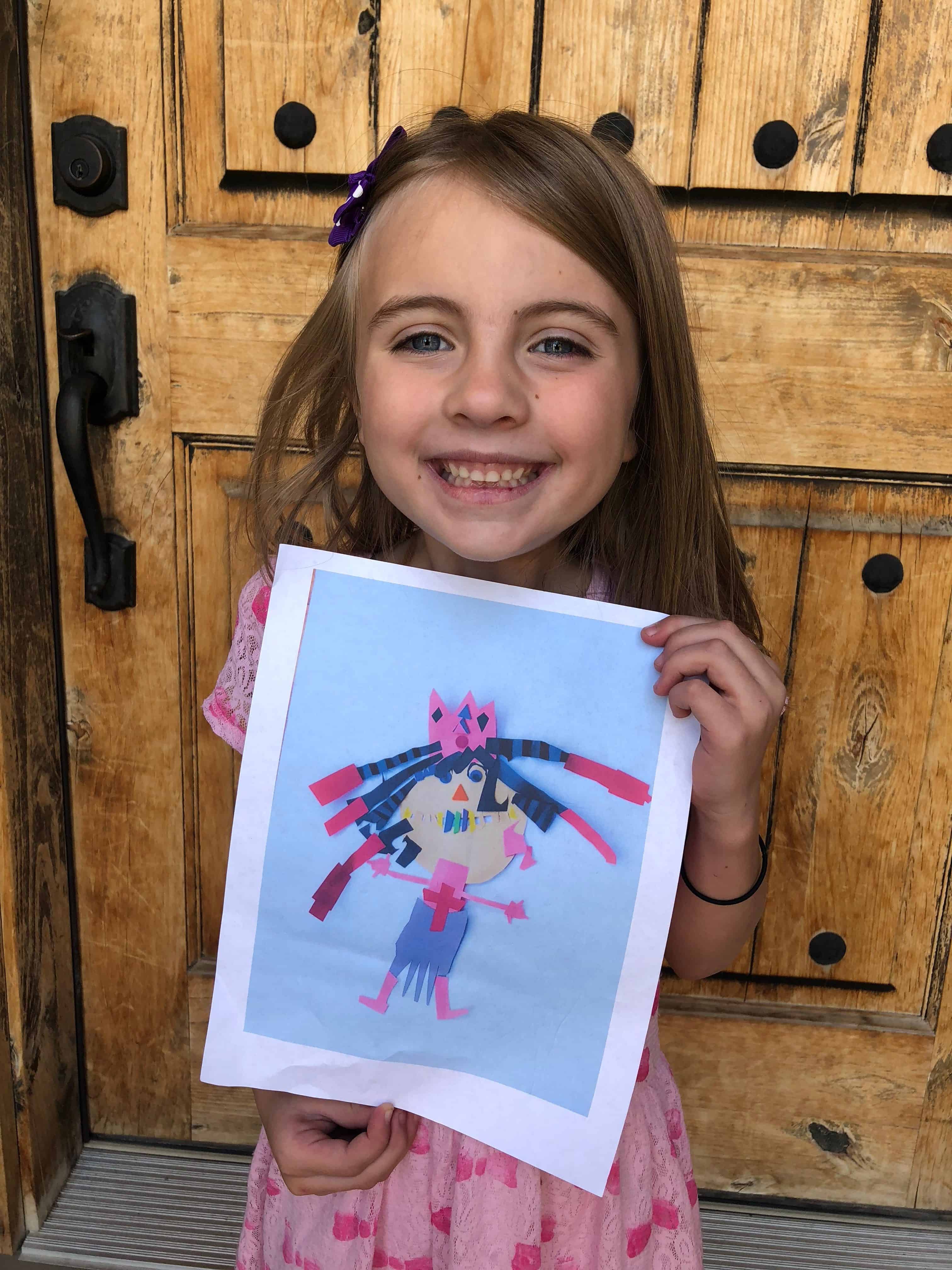 A little girl posing for a picture