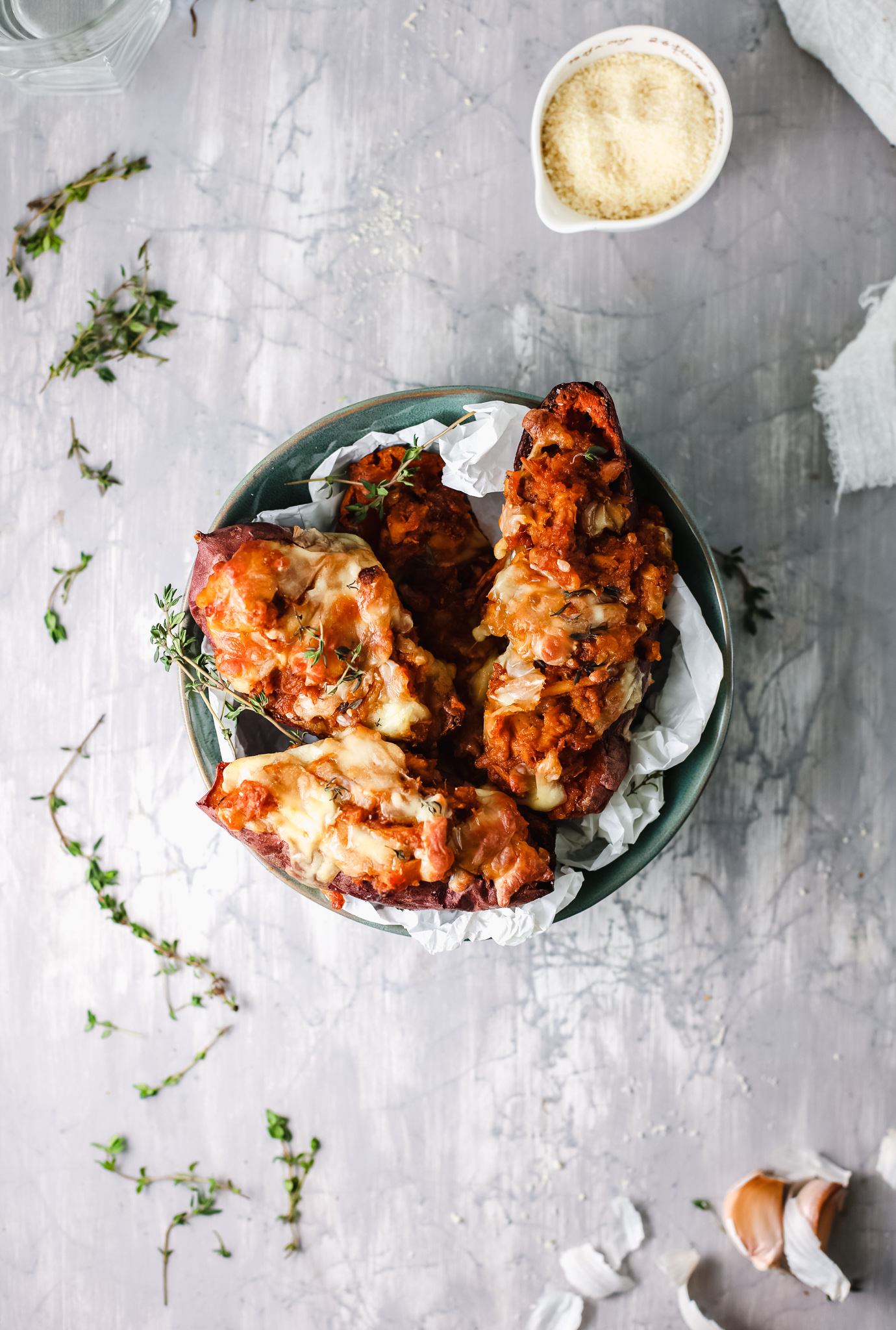 A plate of food with a sweet potato 