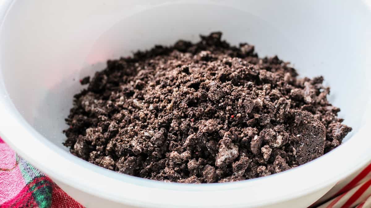 A close up of crushed Oreos in bowl