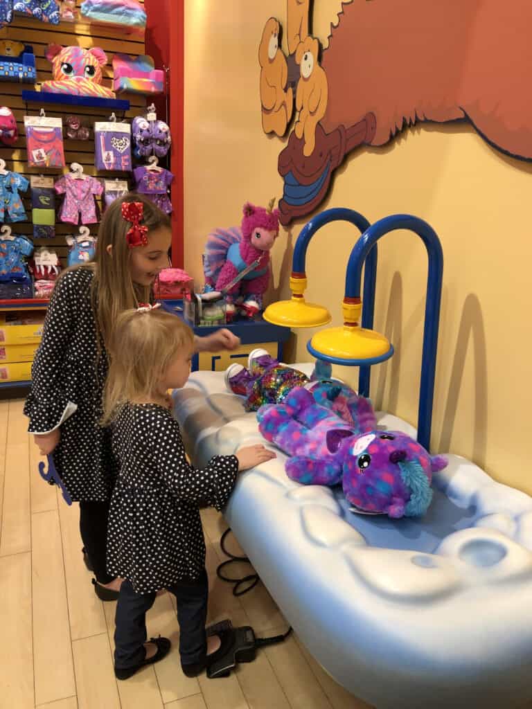 A person sitting on display in a store