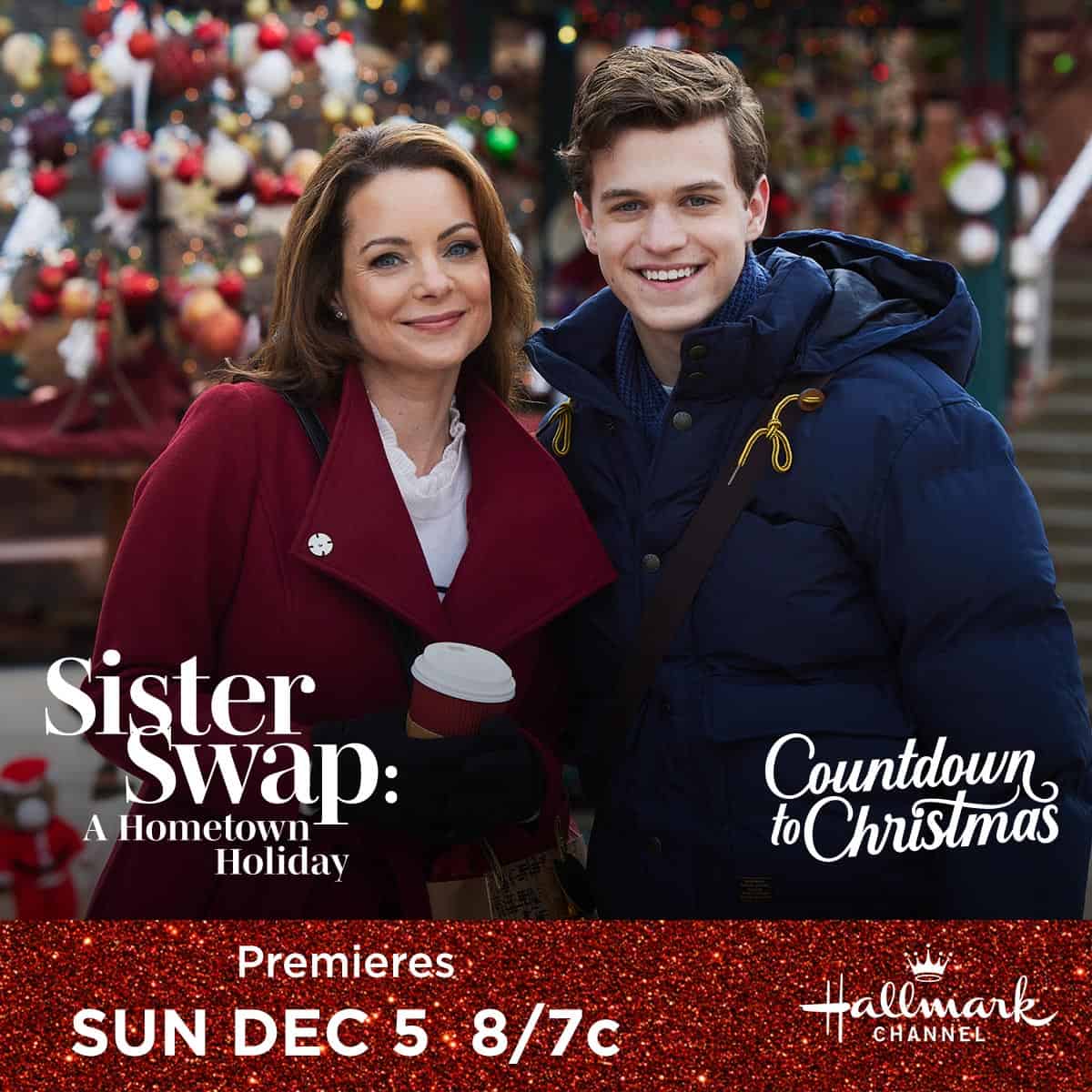 Promotional poster for "Sister Swap: A Hometown Holiday," featuring two smiling actors in the foreground with a festive, crowded scene in the background, and details of the premiere date on the hall