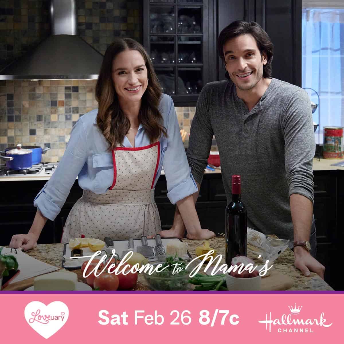 Two actors on a film set designed to look like a kitchen, promoting a television movie titled "Welcome to Mama's" airing on the Hallmark Channel.