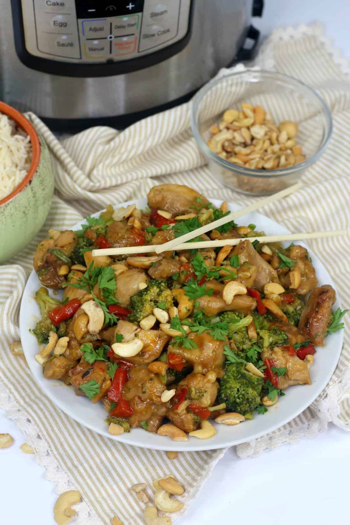 cashew chicken in front of instant pot