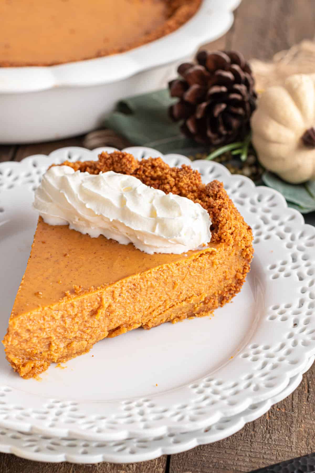 slice of pumpkin pie with graham cracker crust