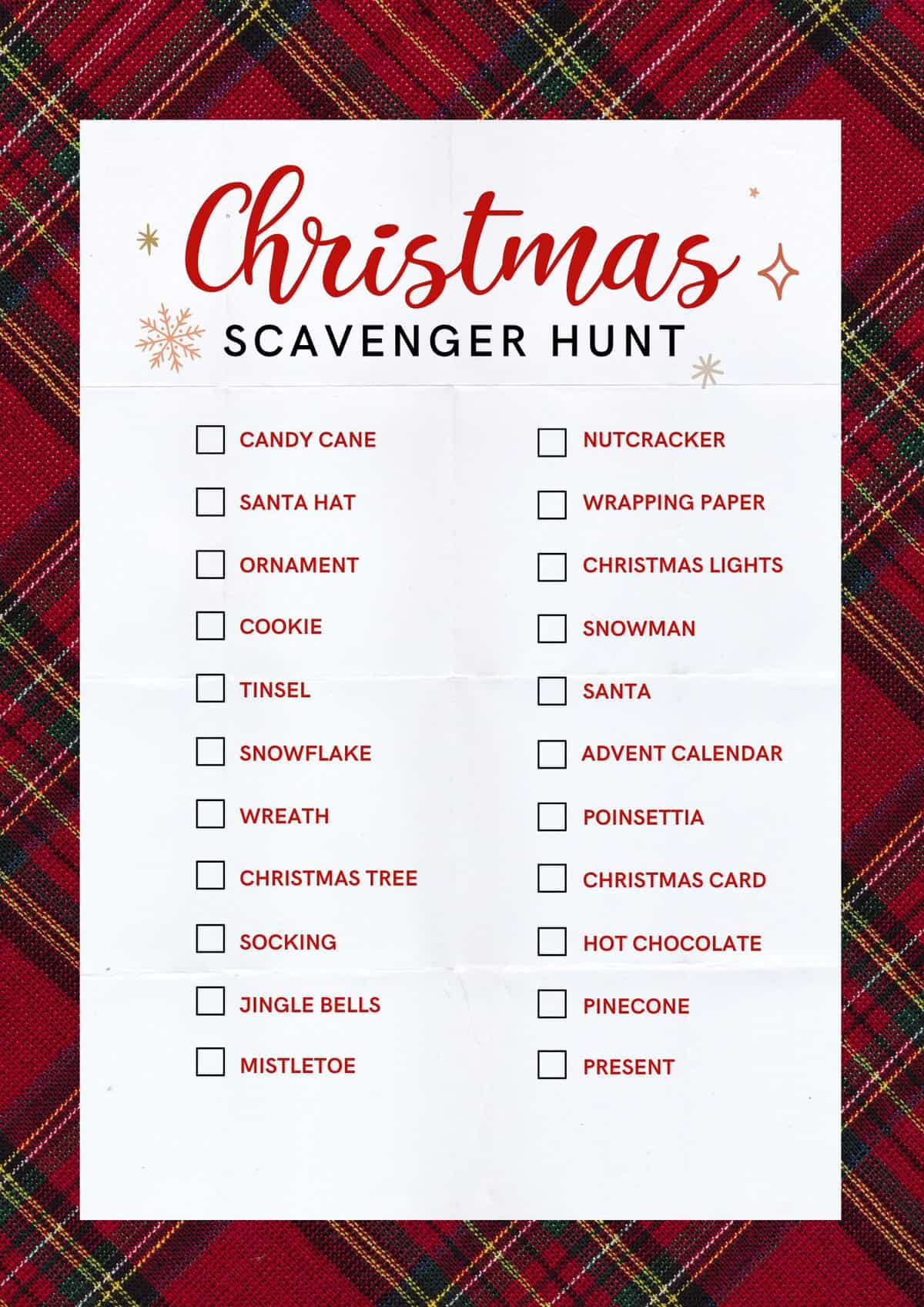 A Christmas-themed scavenger hunt printable checklist displayed on a plaid background.