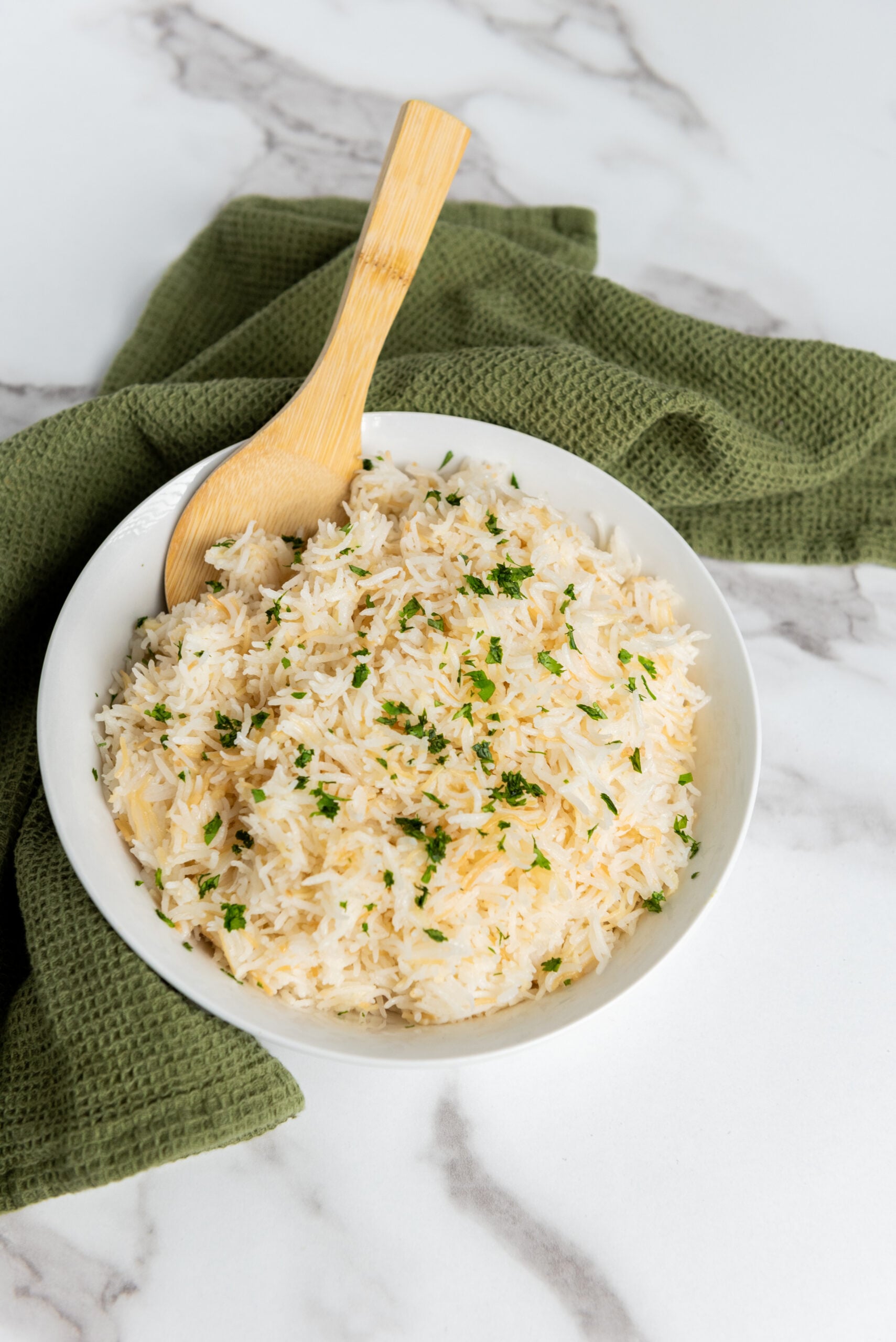Freshly cooked basmati rice infused with golden garlic