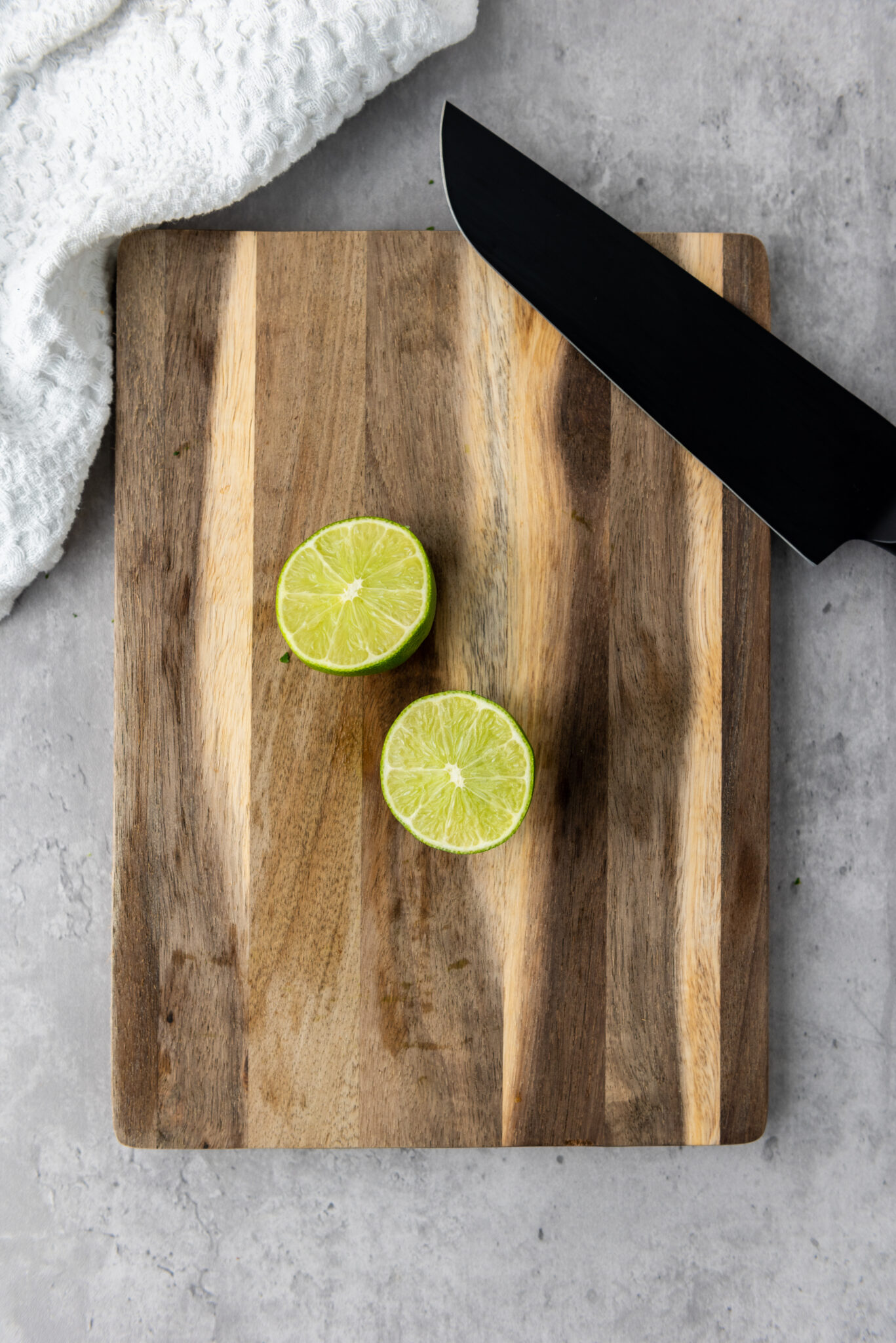 Two lime halves side by side.