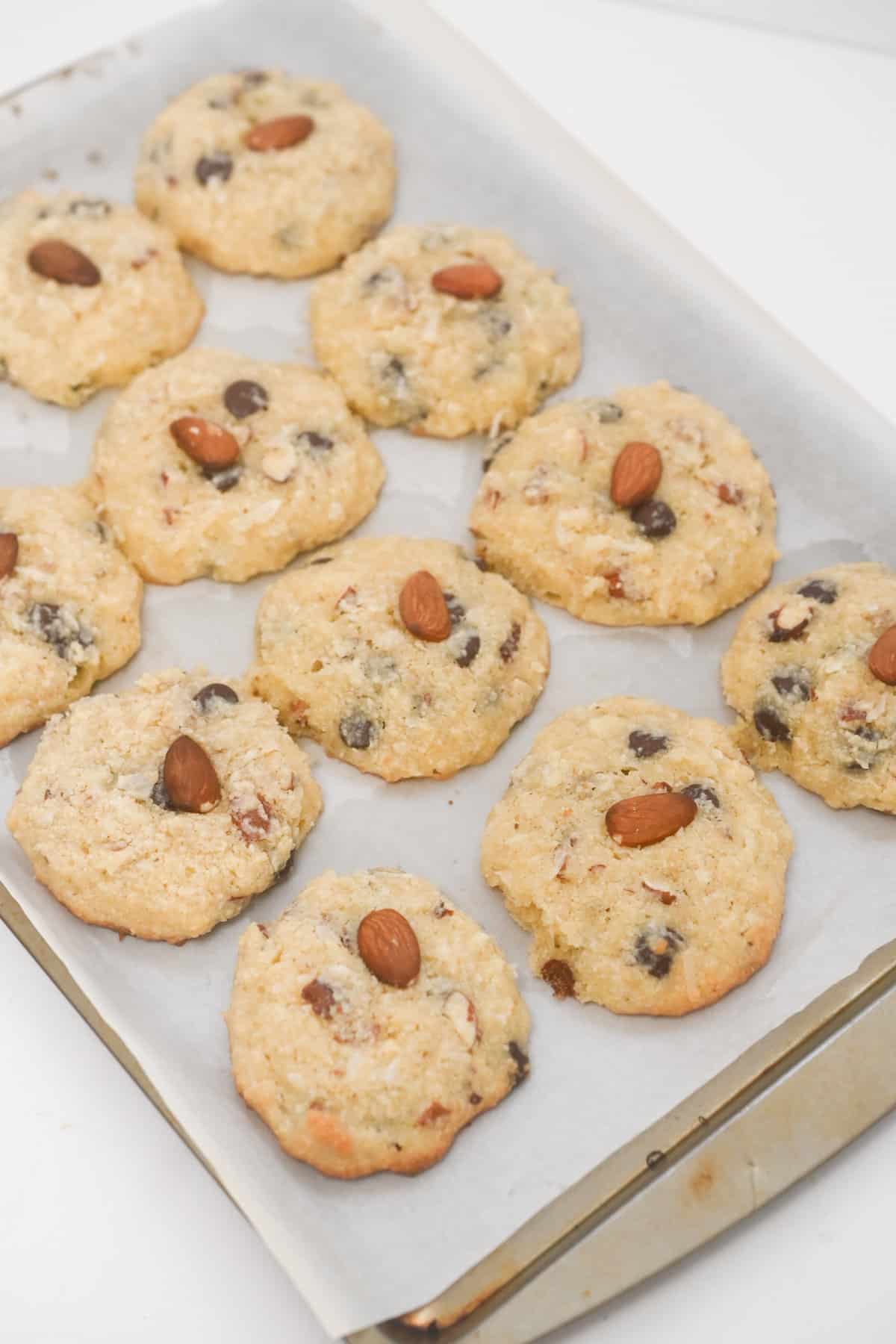 A mouthwatering image of Keto almond joy cookies, showcasing their coconut and almond toppings on a chocolate base, ideal for a low-carb and indulgent treat.