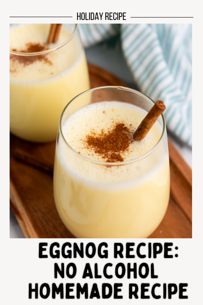 Creamy eggnog in a clear glass with a sprinkle of nutmeg on top