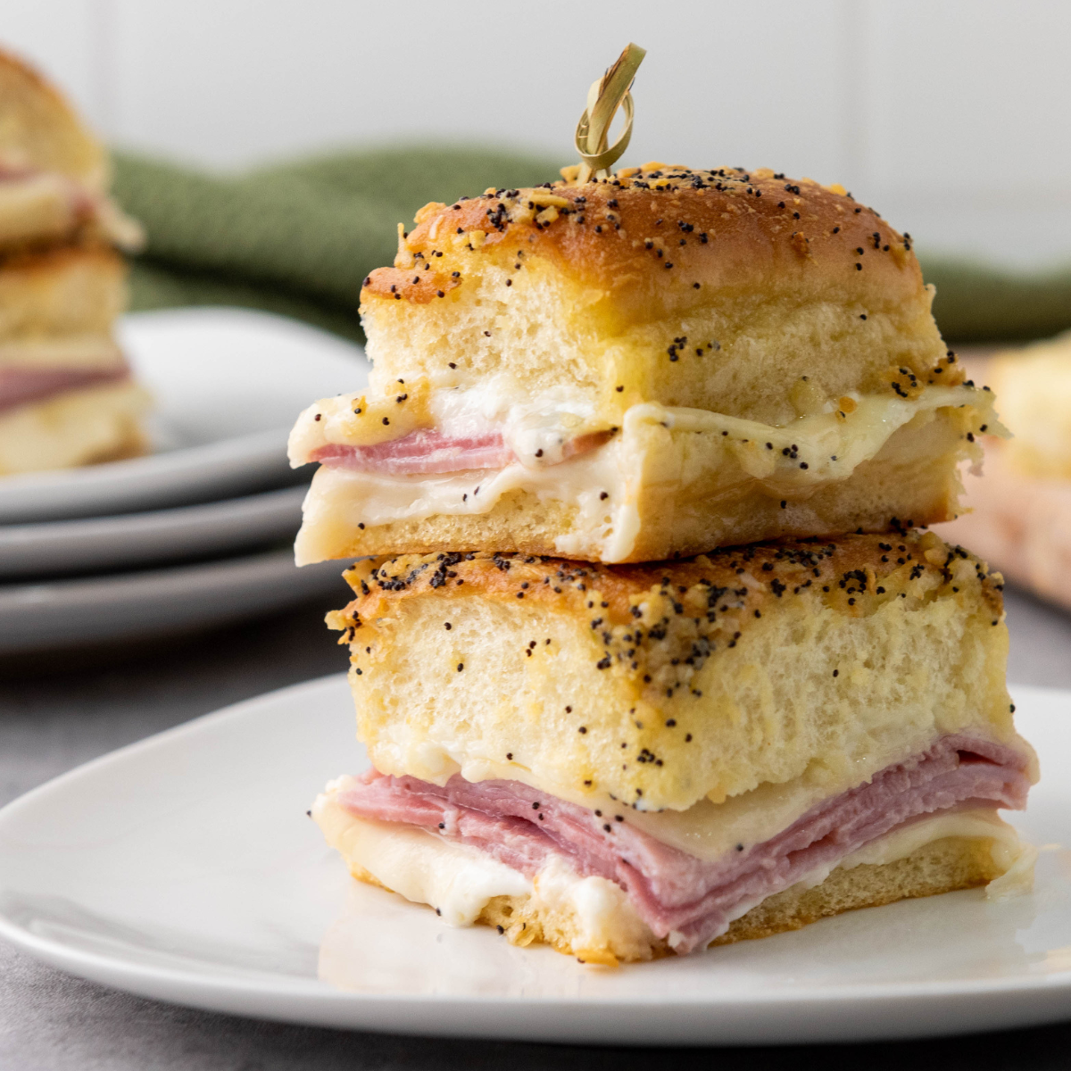 kings hawaiian ham and cheese sliders on a white plate
