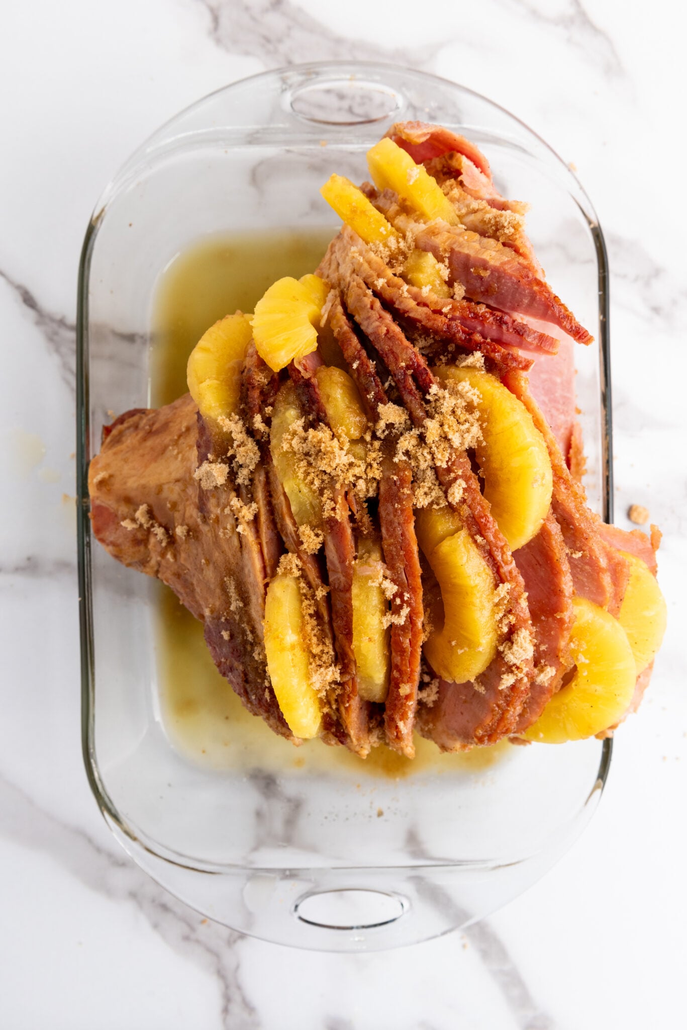 adding brown sugar to ham