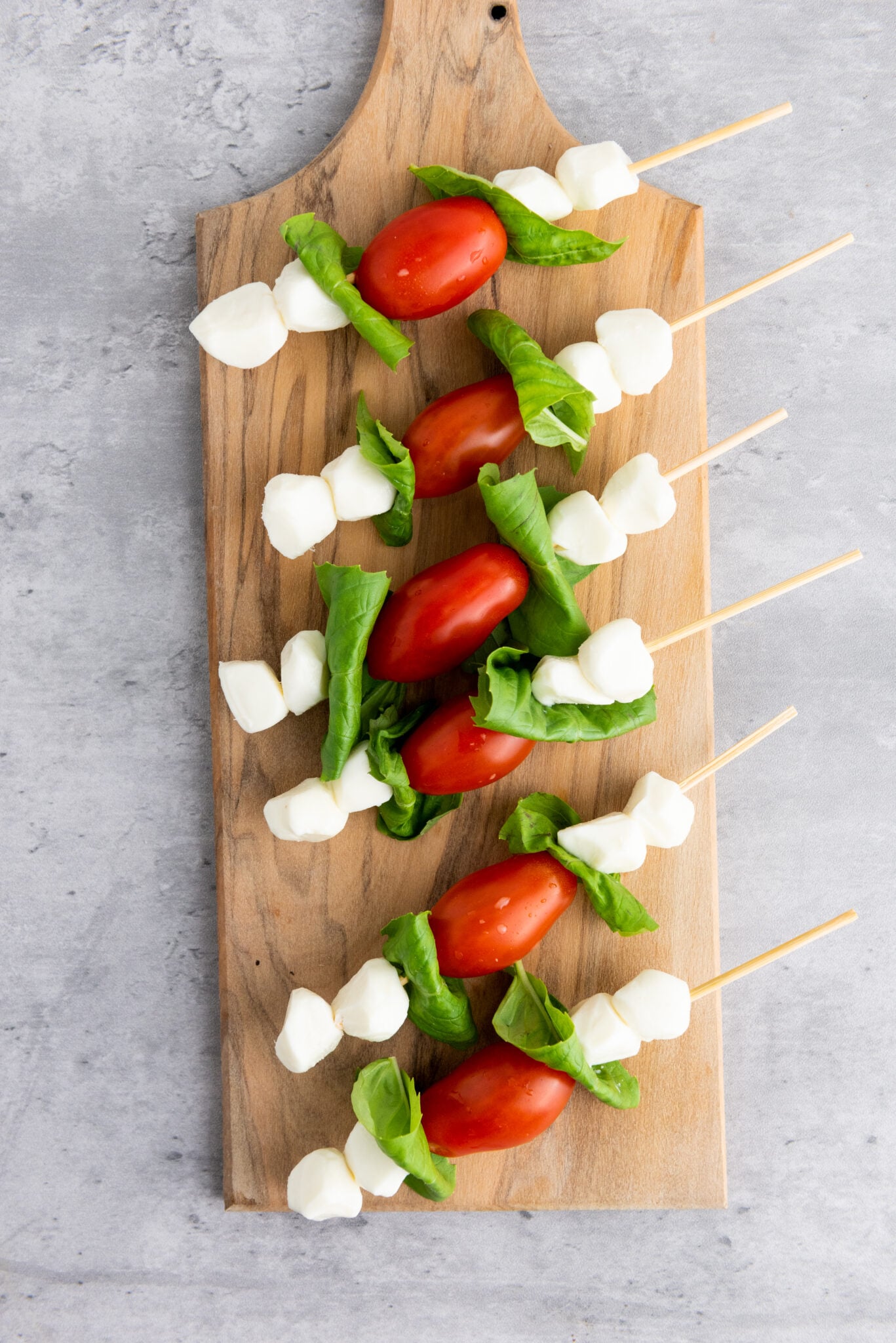 tomato, basil and mozzarella cheese on a skewer